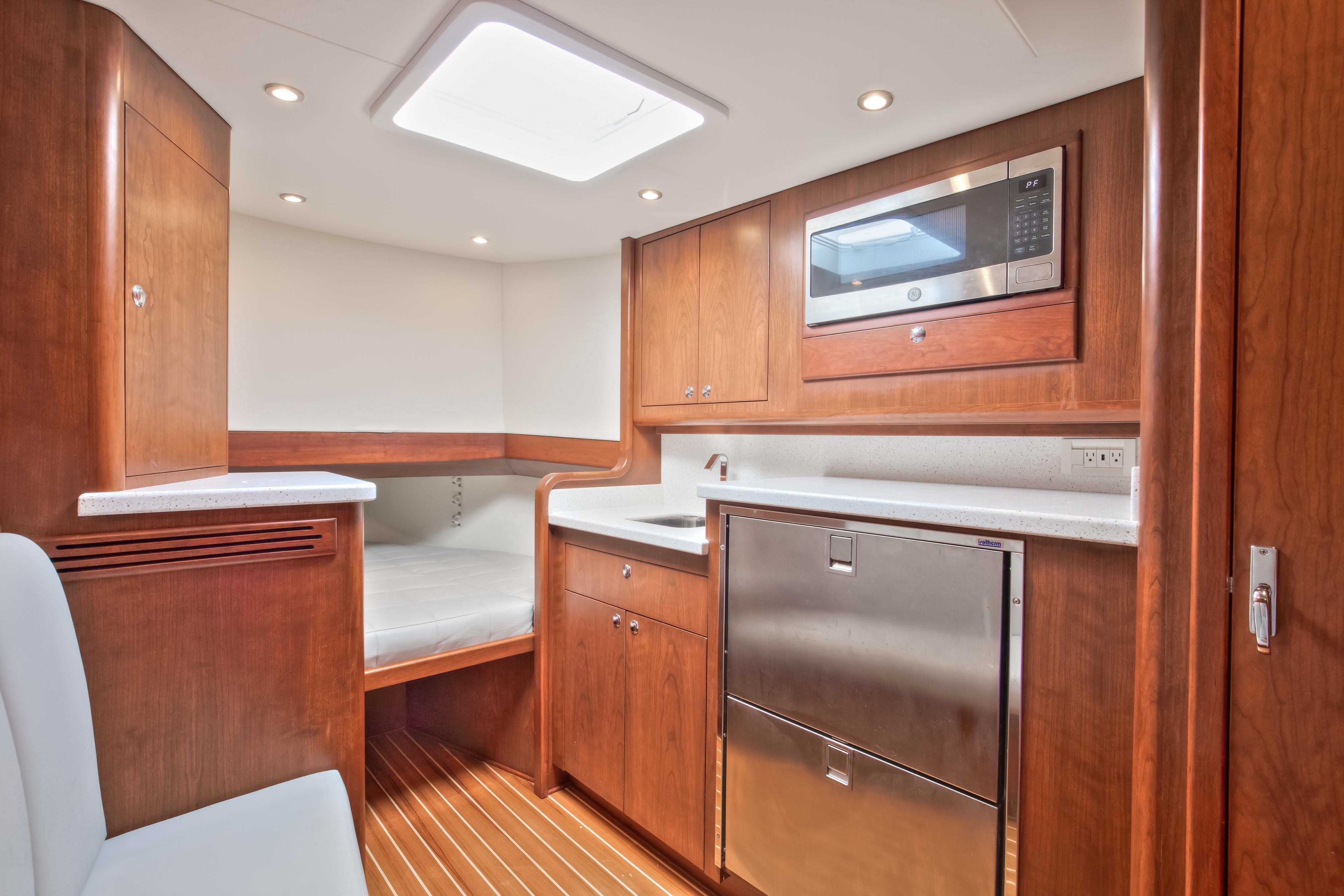 Luxurious interior of 2026 Release Boatworks 46 Walkaround with modern kitchen amenities.