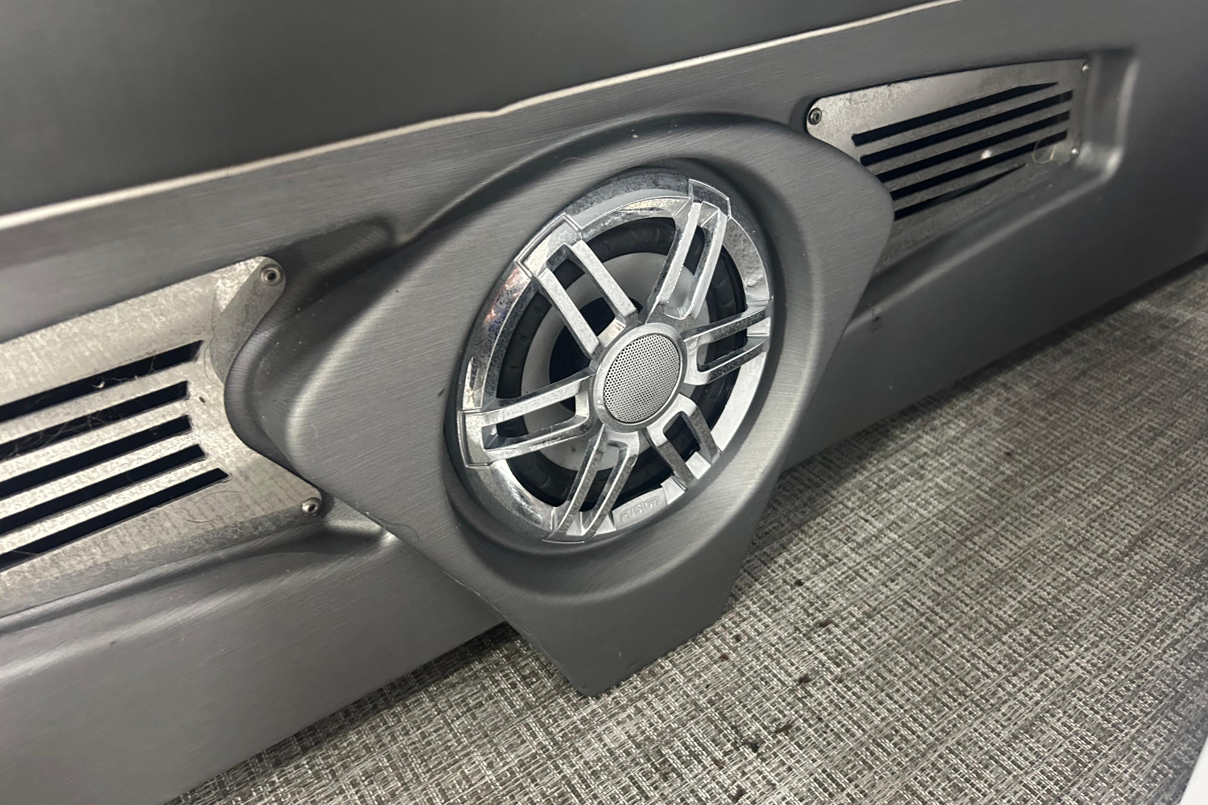 Speaker detail on 2022 Tahoe Pontoon Cascade Quad Lounger boat interior.
