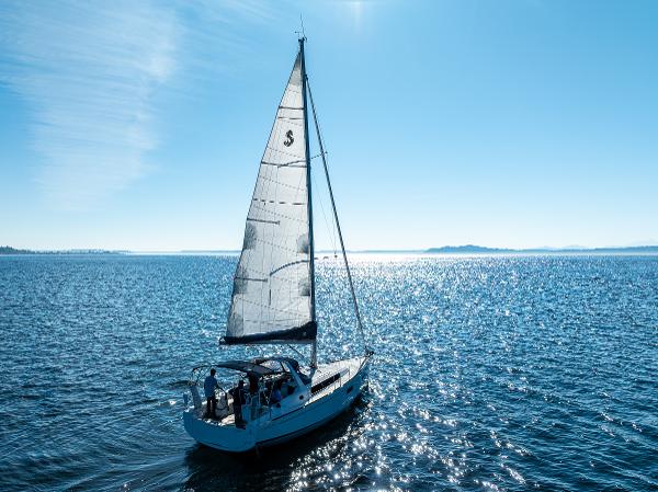 Beneteau Oceanis 38.1 sailboat on open sea, 2021 model.