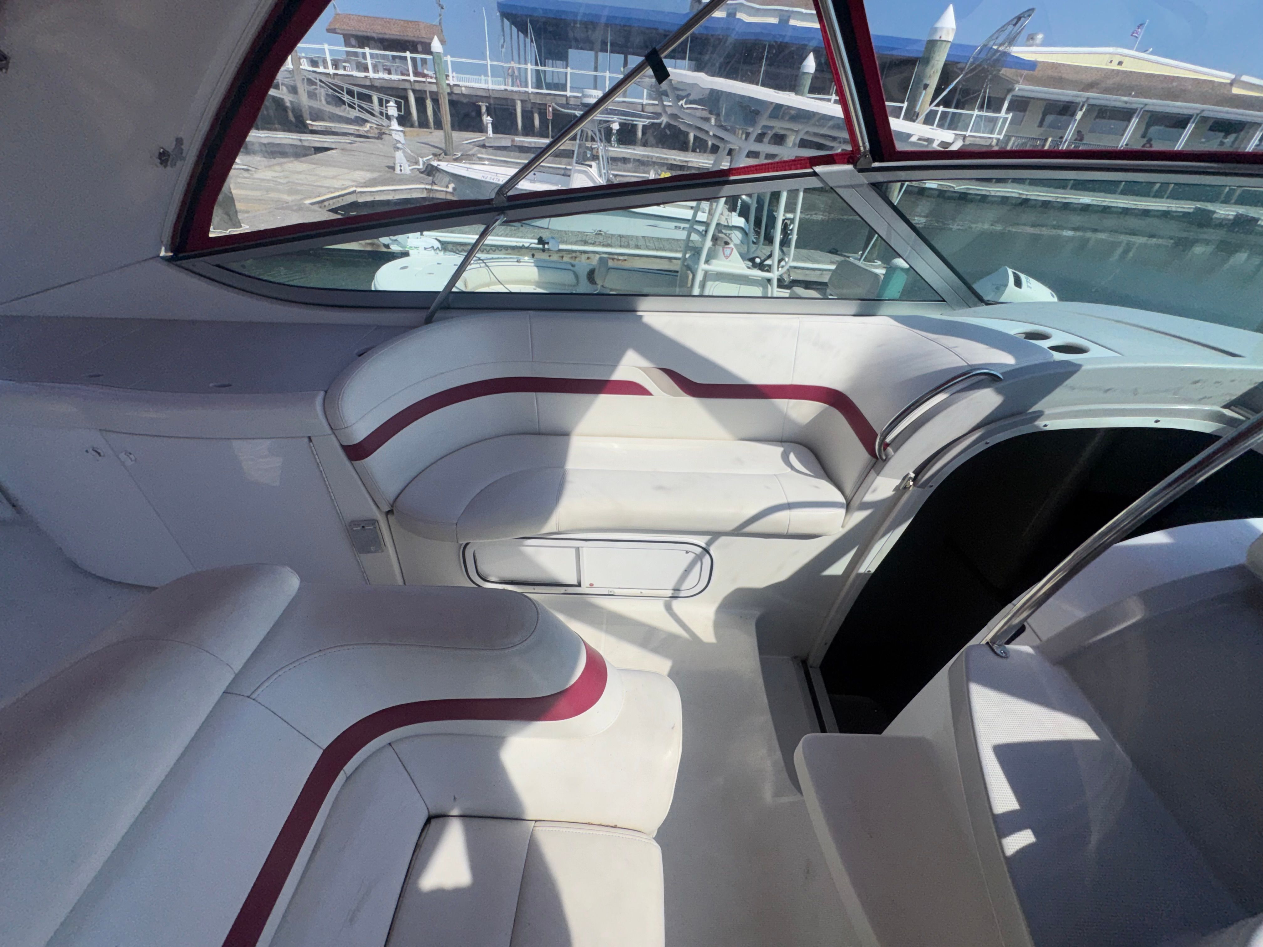 Interior of a 2001 Formula 37 SUPER SPORT yacht with white seating.