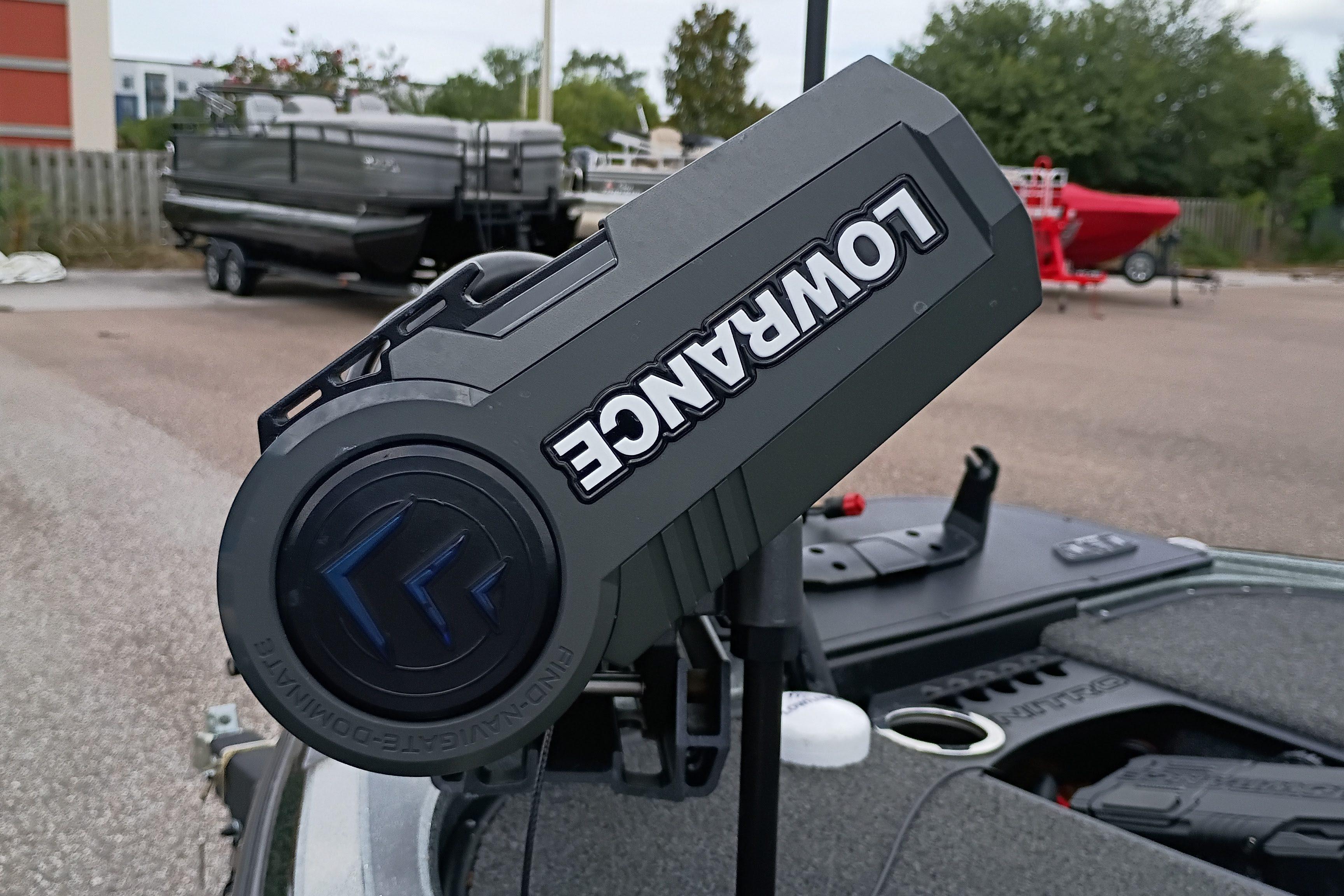 Lowrance device on 2024 Nitro Z19 Pro boat, parked outdoors.