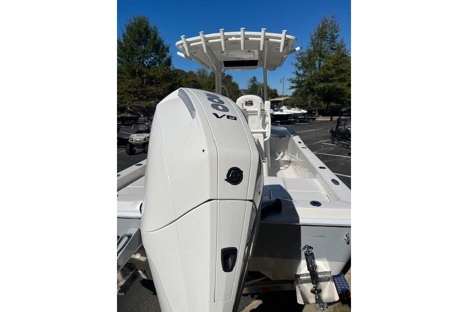 2025 Ranger 2510 Bay boat with powerful V8 engine, parked outdoors.