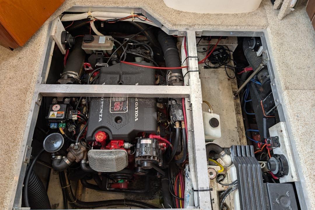 Engine compartment of a 2003 Carver 356 Motor Yacht, featuring a Volvo Penta engine.
