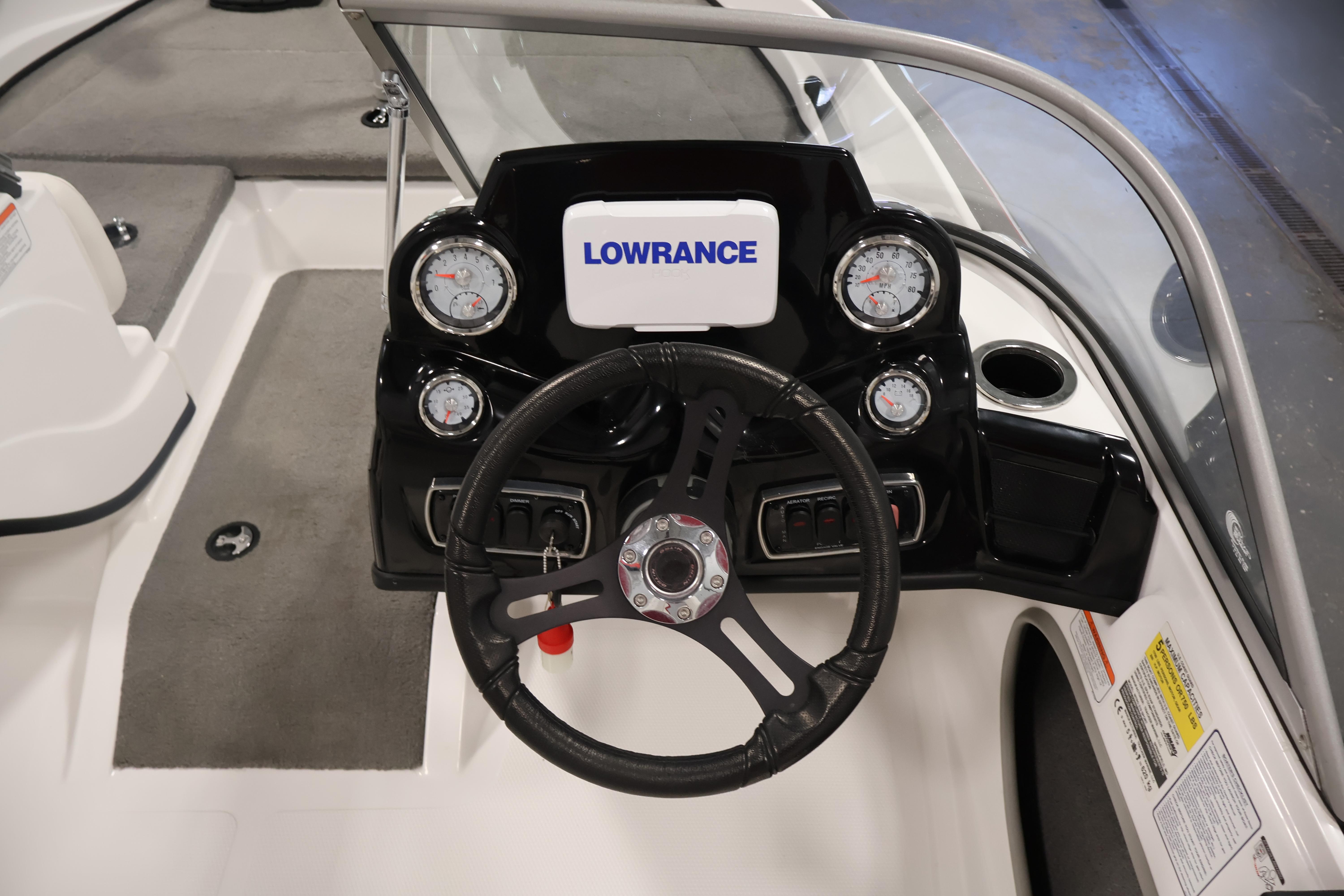 Steering console of 2019 Nitro Z19 Sport boat with Lowrance display and gauges.