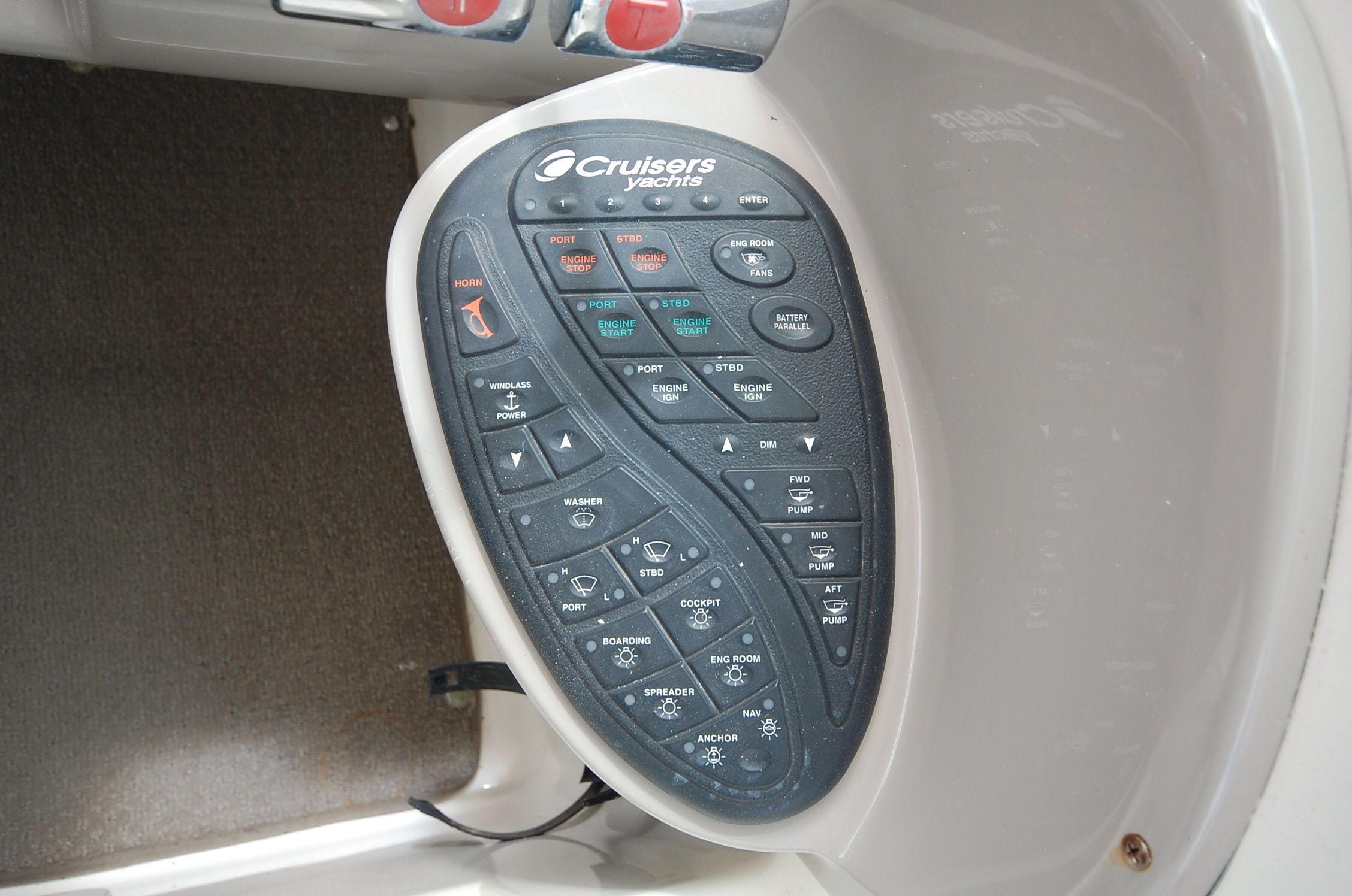 2004 Cruisers Yachts 3970 control panel with various switches.