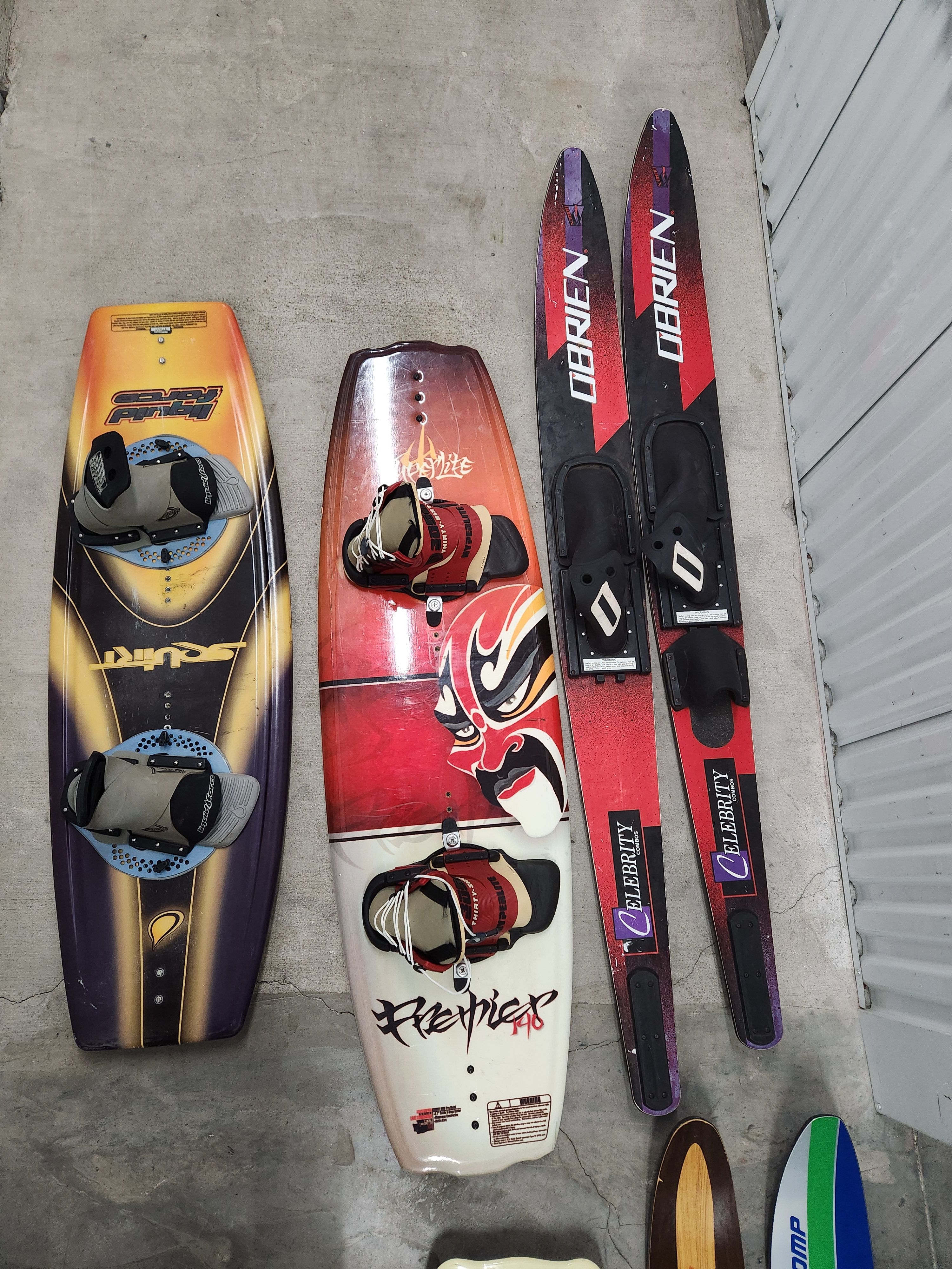 Wakeboards and water skis on concrete floor, Crownline 225 BR 2003.