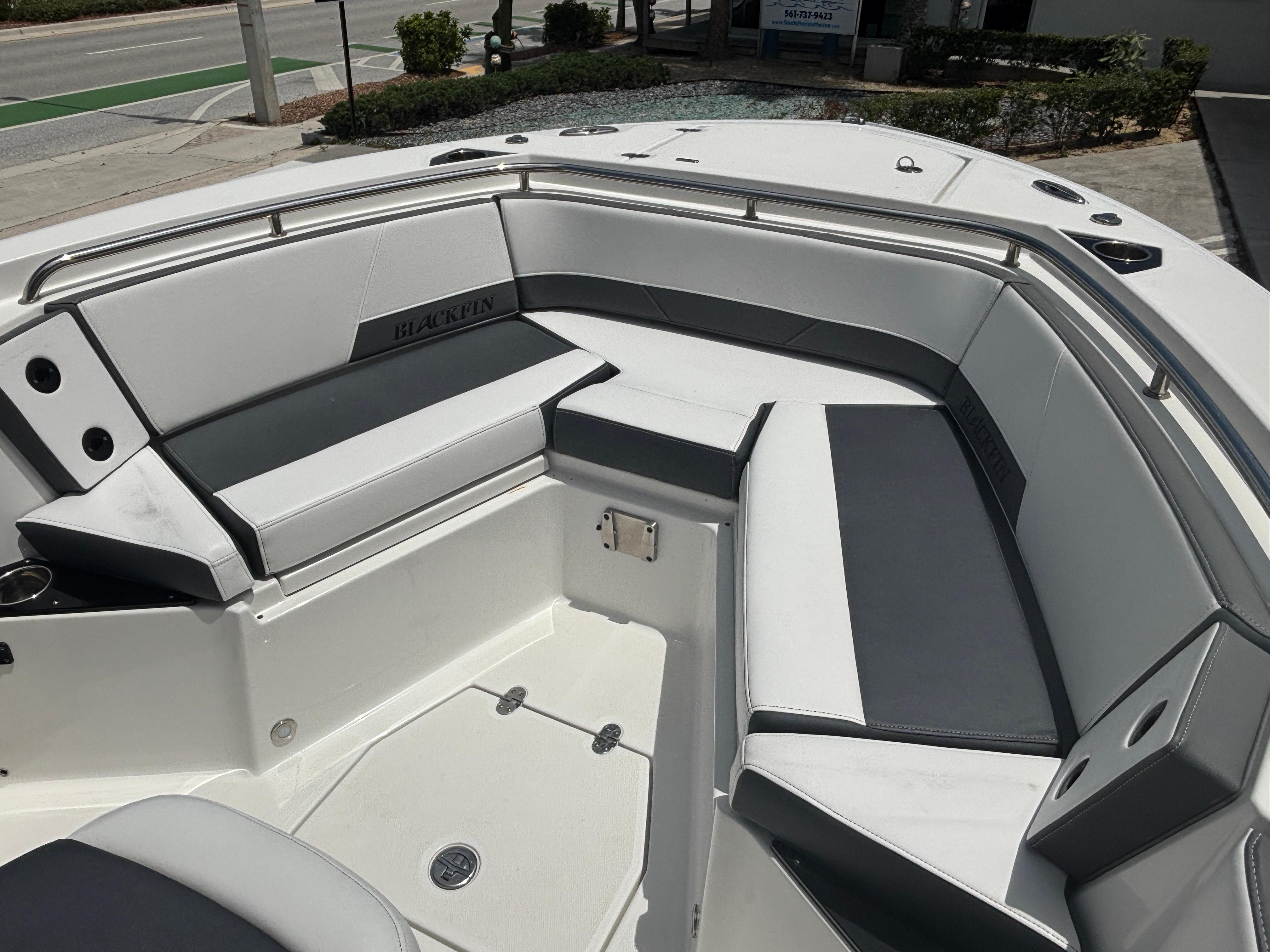 2019 Blackfin 242 CC boat interior with cushioned seating and sleek design.