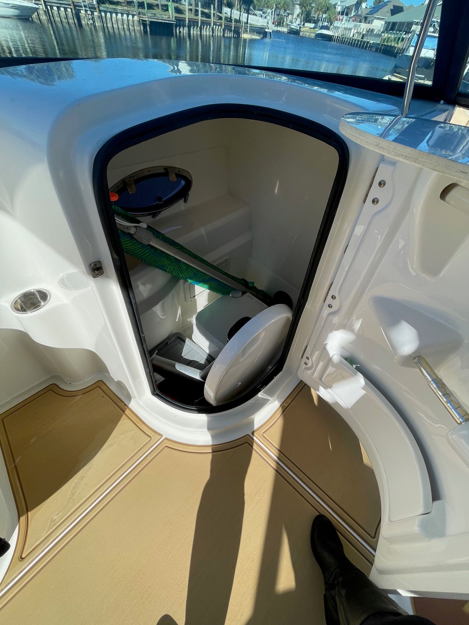 2019 NauticStar 243DC Sport Deck with cabin and toilet.