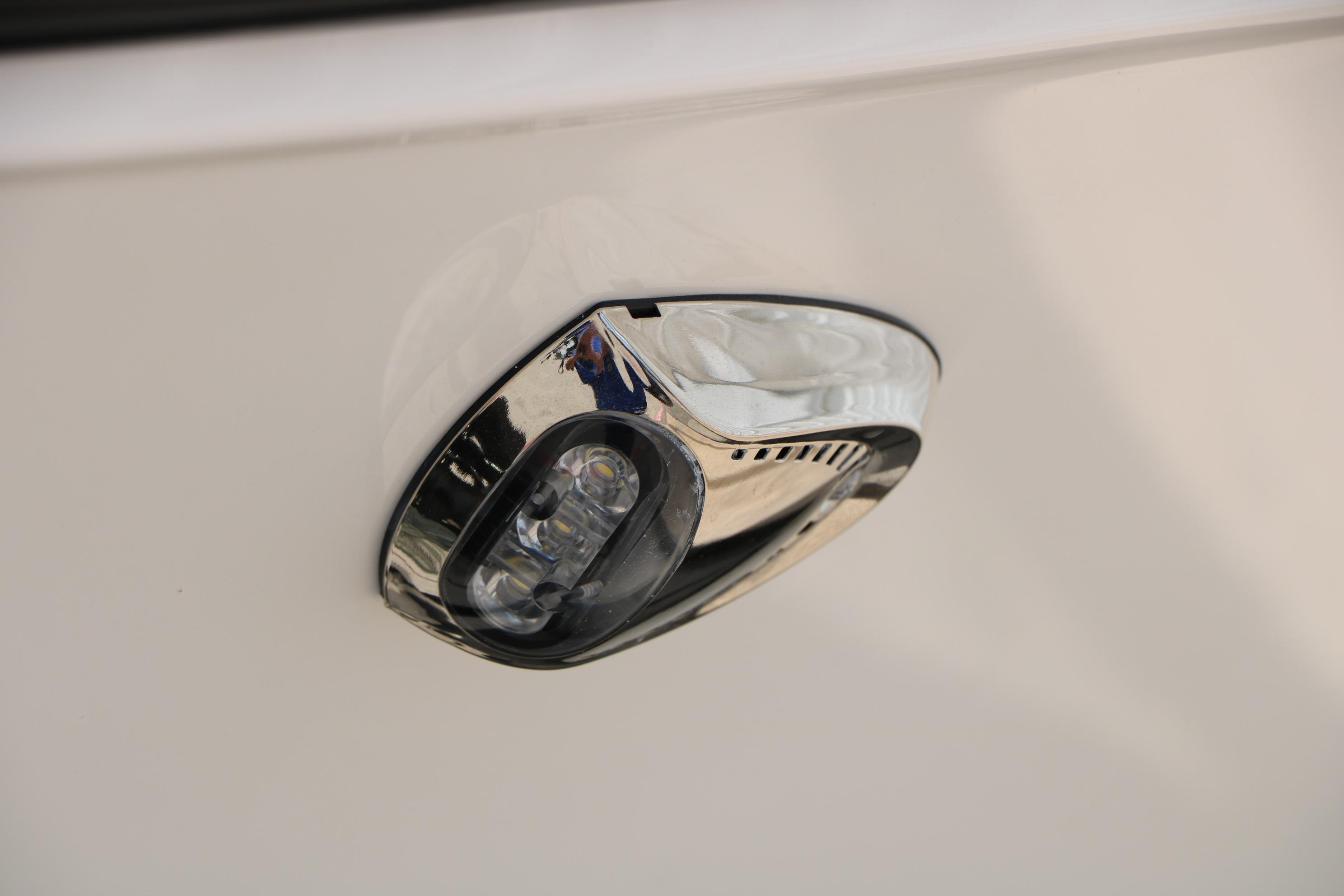2025 Chaparral 23 SSi boat detail, featuring a sleek chrome light fixture.