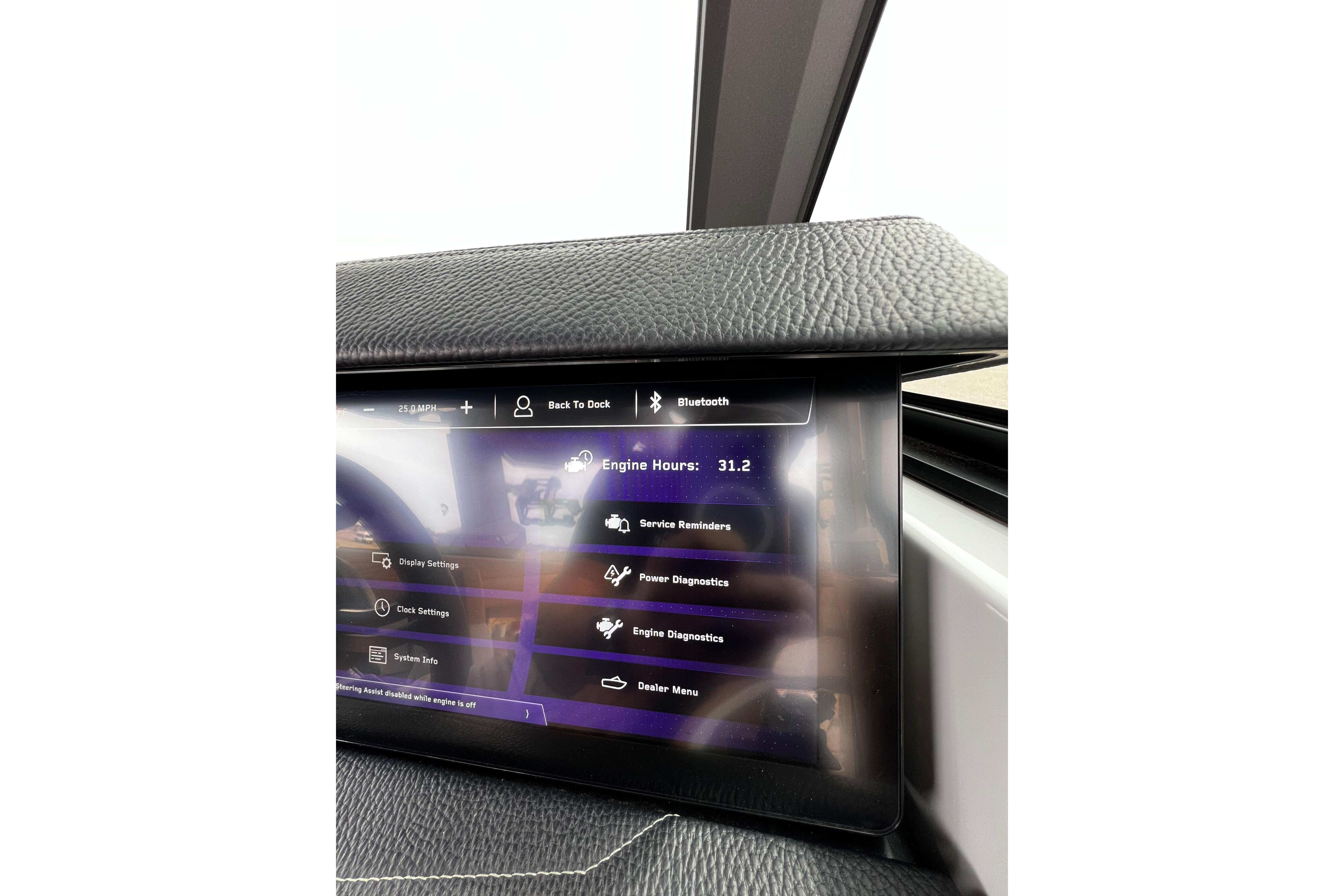 Touchscreen display in 2026 Nautique Super Air Nautique G25 showing engine hours and settings.
