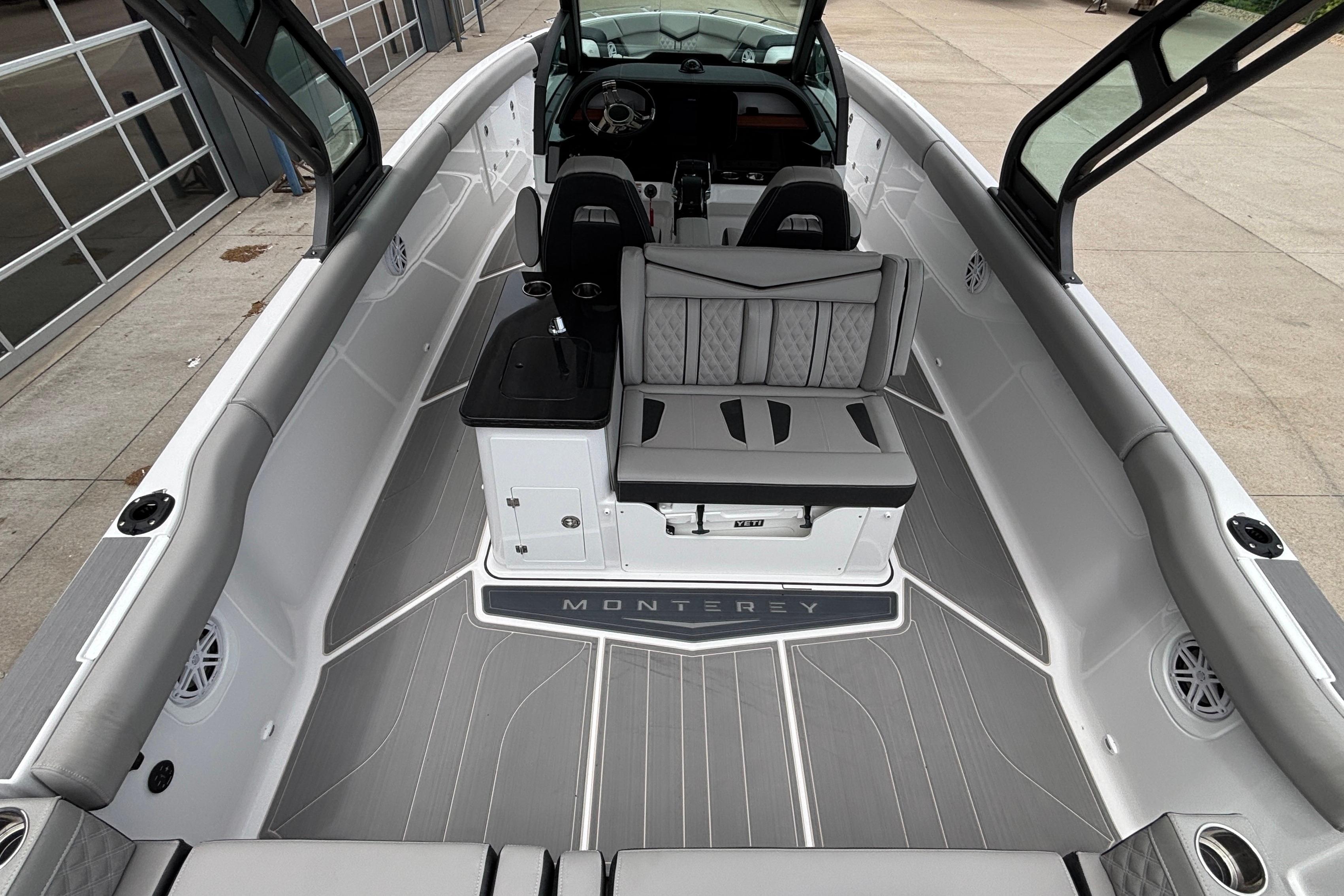 2026 Monterey Elite 30 OB boat interior with sleek seating and modern design.