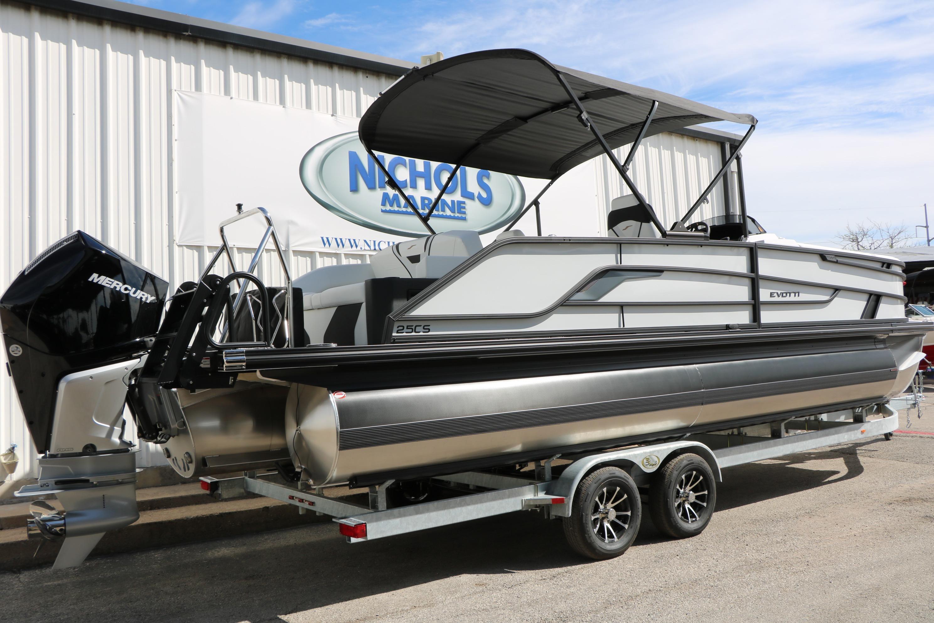 2026 Evotti 725 CS Tri-Toon boat on trailer, displayed at Nichols Marine.