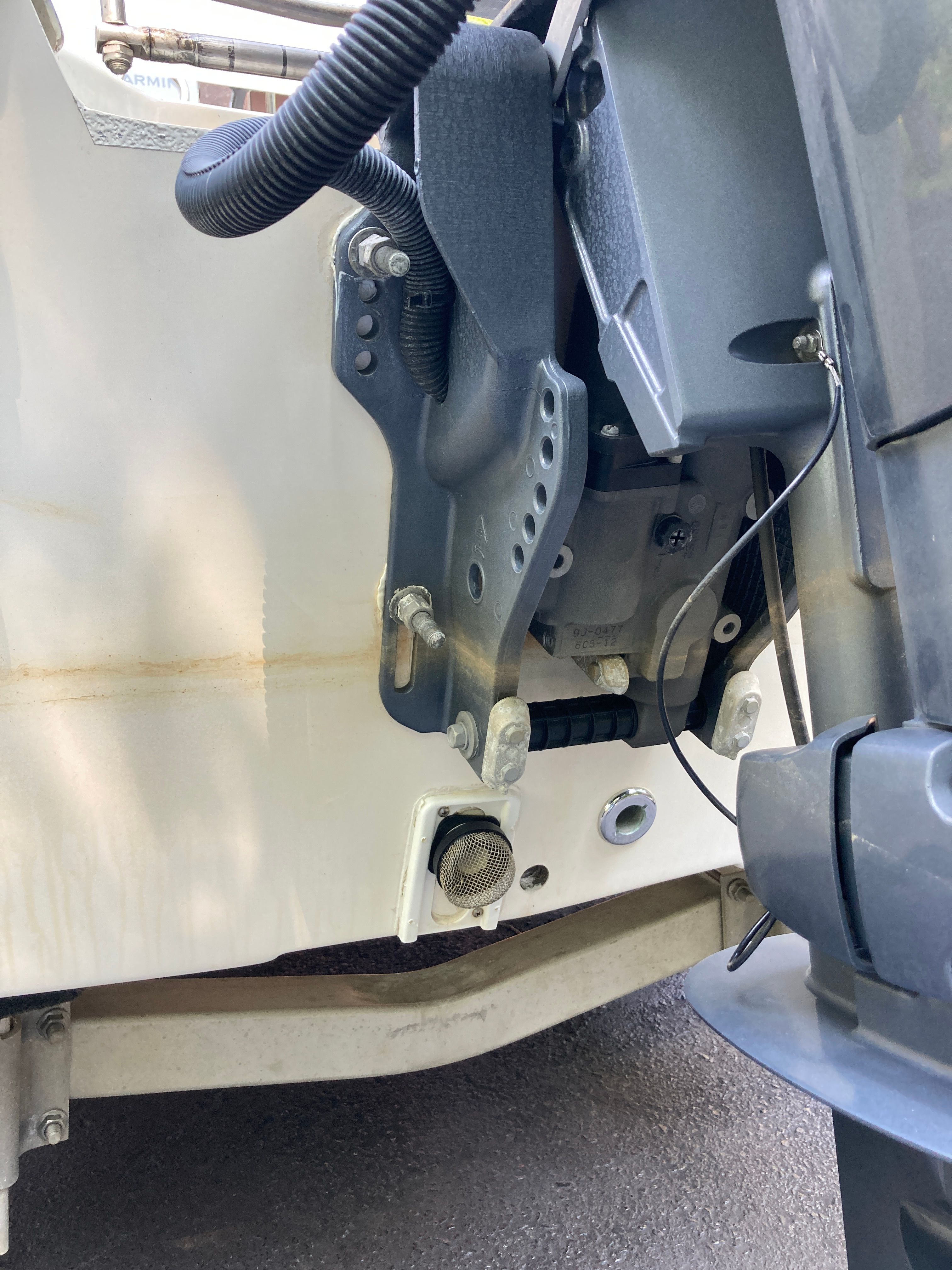 Close-up of the outboard motor on a 2012 Carolina Skiff JVX16CC.