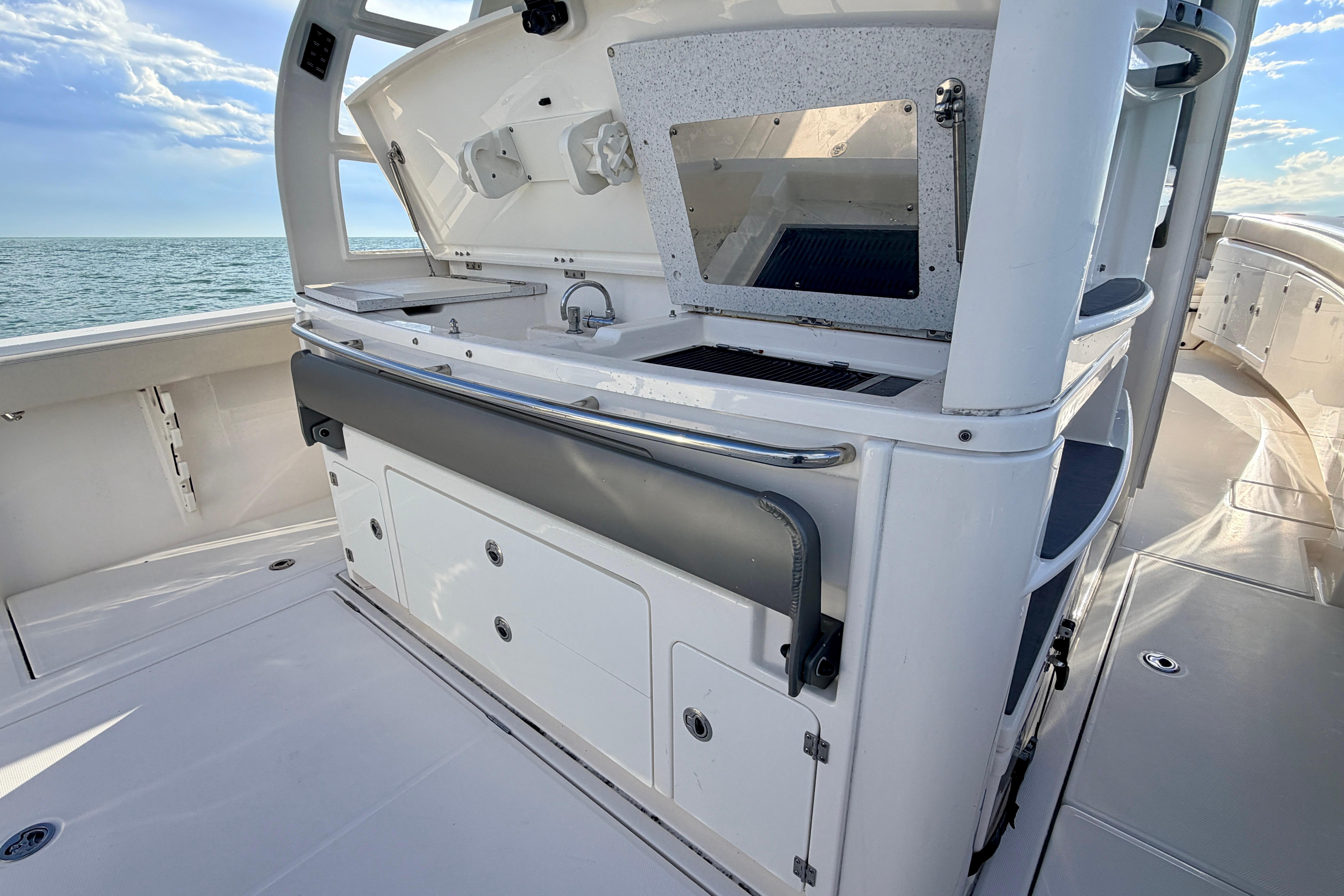 2024 Solace 41 CS boat interior with sleek kitchen and ocean view.