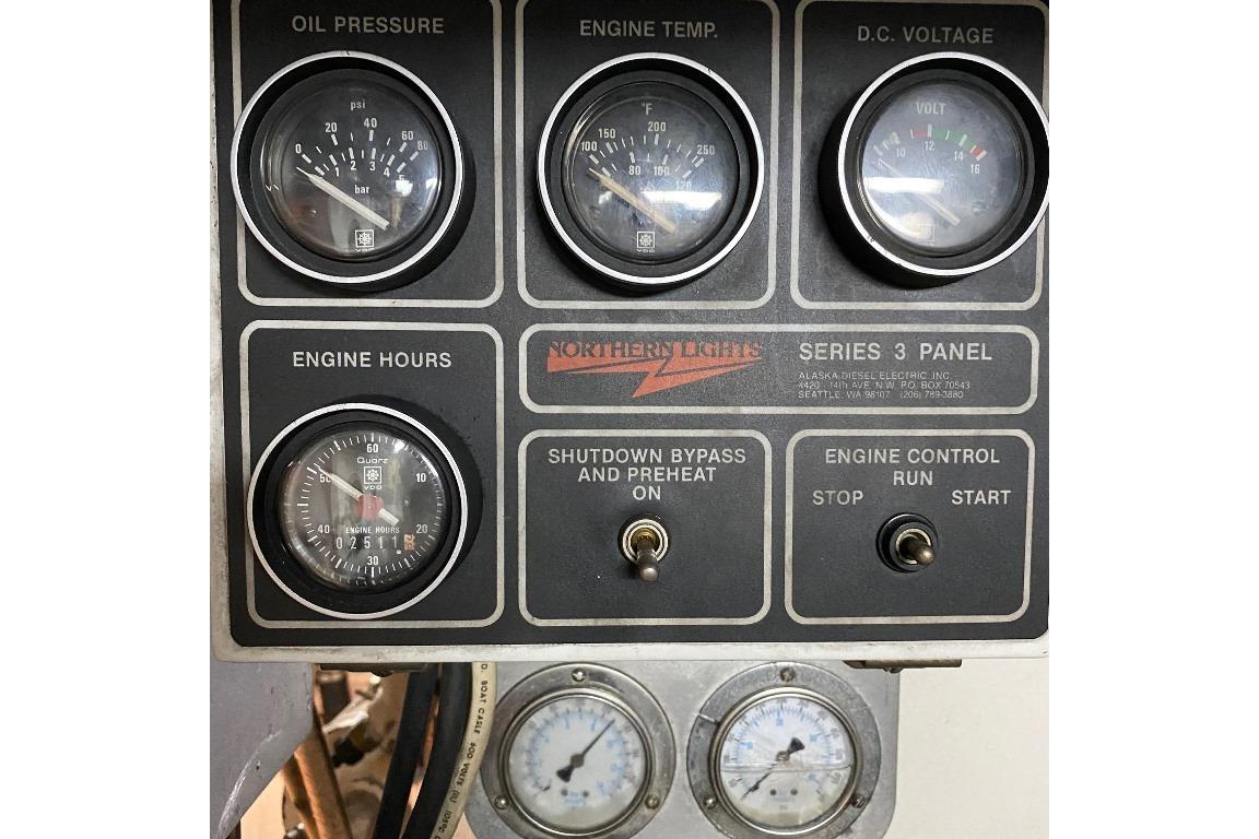 Control panel of a 1988 Burger 80 Motor Yacht with gauges and switches.