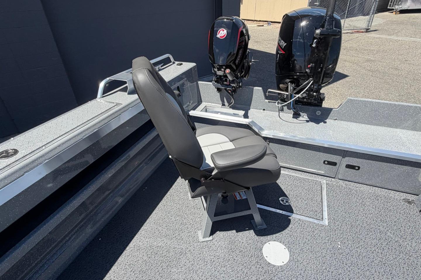 2026 Thunder Jet 209 Rush OT boat interior with seating and dual Mercury outboard motors.
