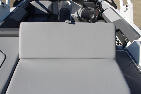 2025 Cobalt CS23 boat interior with gray seating and modern design.