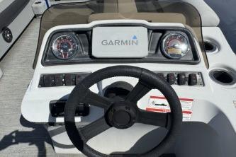 2021 Godfrey Sweetwater 2286 C boat dashboard with Garmin navigation system.