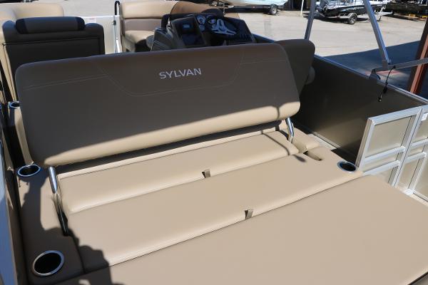 2025 Sylvan Mirage 820 CLZ DH boat interior with tan seating and cup holders.