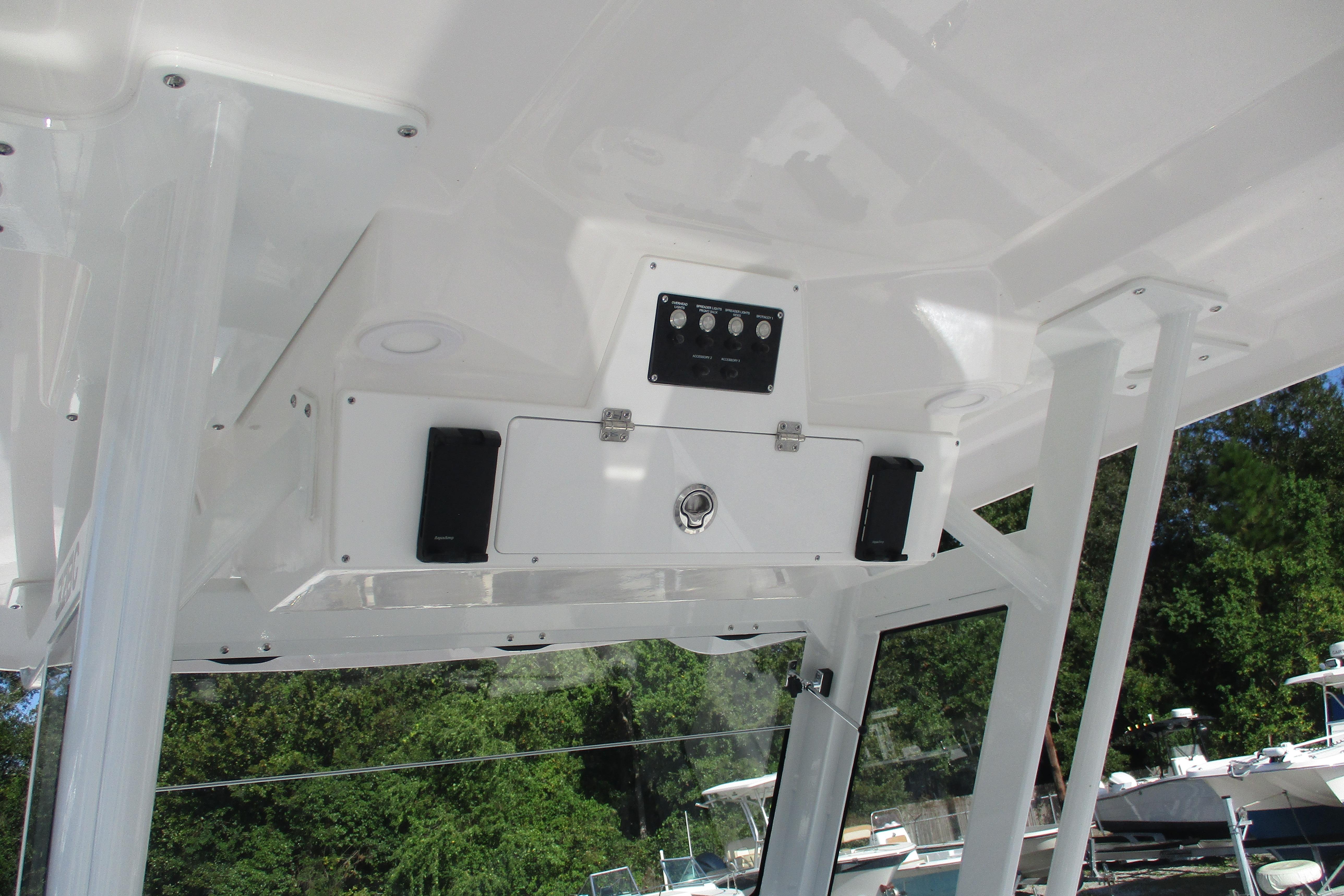 2026 Sea Fox 328 Commander boat interior with control panel and speakers.