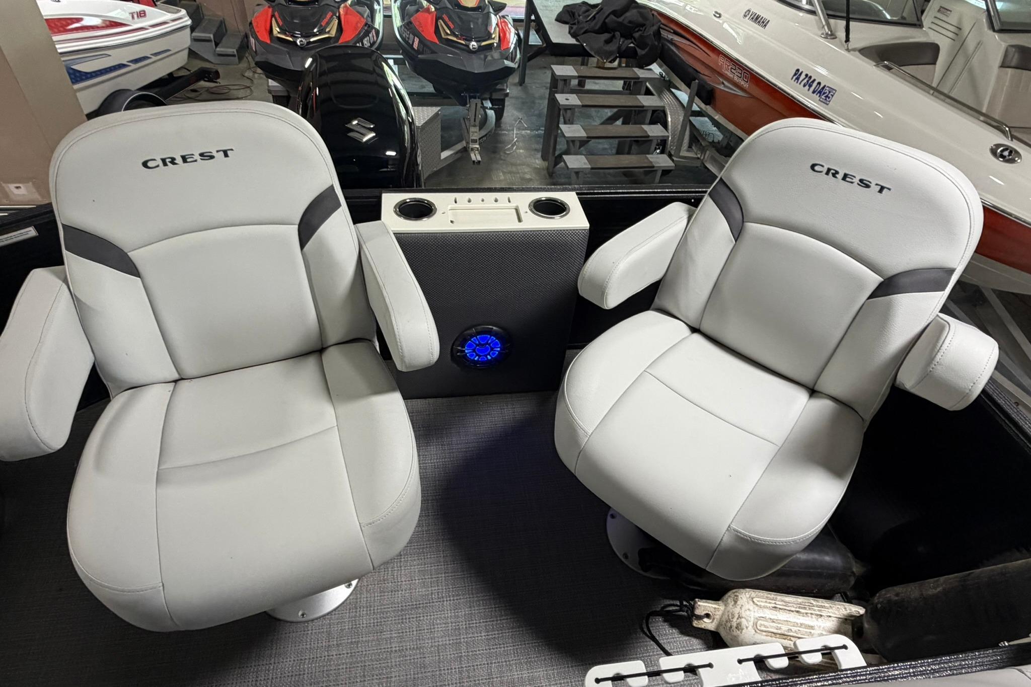 2023 Crest Classic LX 200 boat seats with cup holders and speaker.