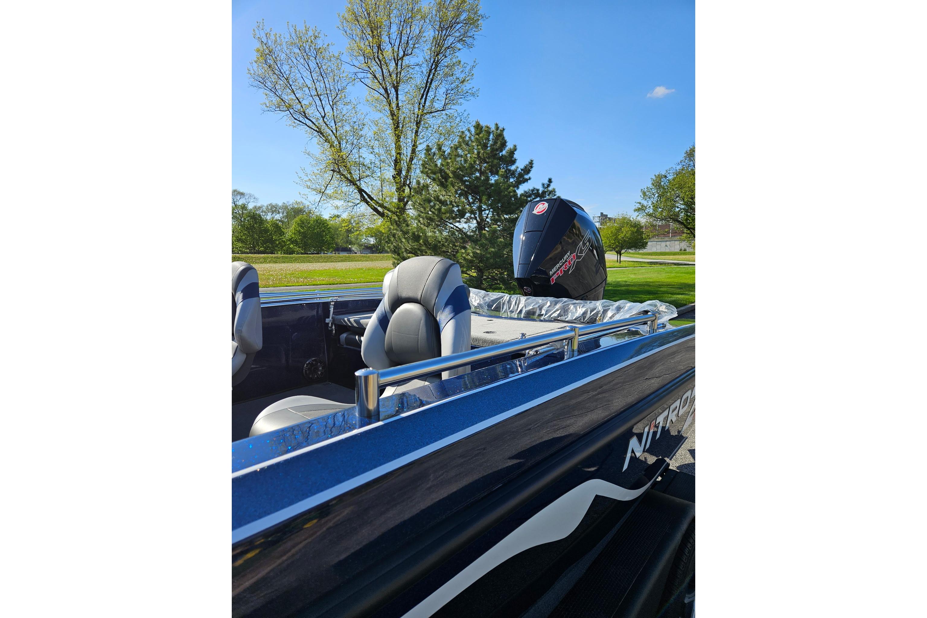 2026 Nitro ZV19 Sport Pro boat with sleek design and powerful engine, parked outdoors.