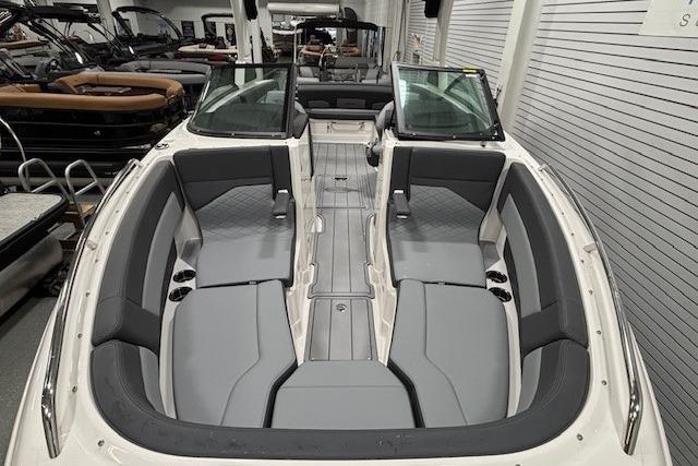 2026 Chaparral SSX 8 boat interior with gray seating and open cockpit design.