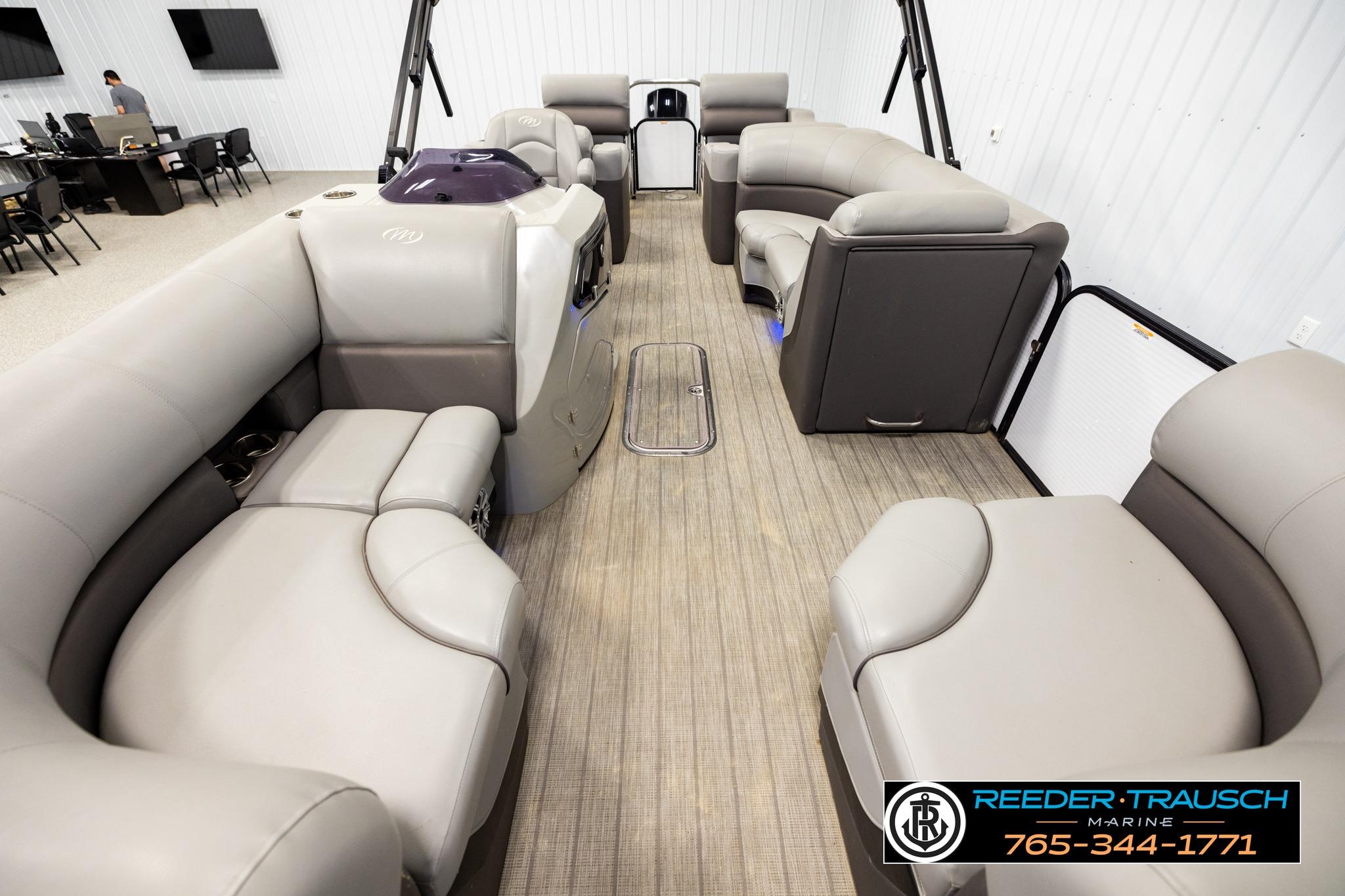 2019 Manitou Oasis SR VP pontoon boat interior with luxurious seating and modern design.