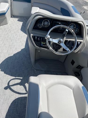 2025 Berkshire 22 RFX LE Tri-toon Pontoon steering console with modern controls and seating.