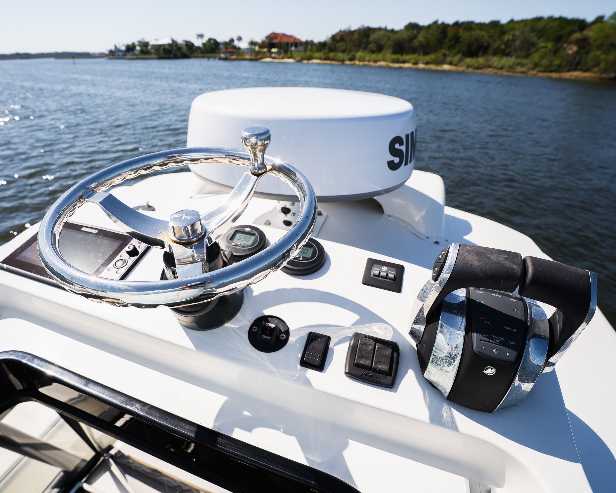 The image shows the helm of a 2022 SeaVee 370Z boat on the water.