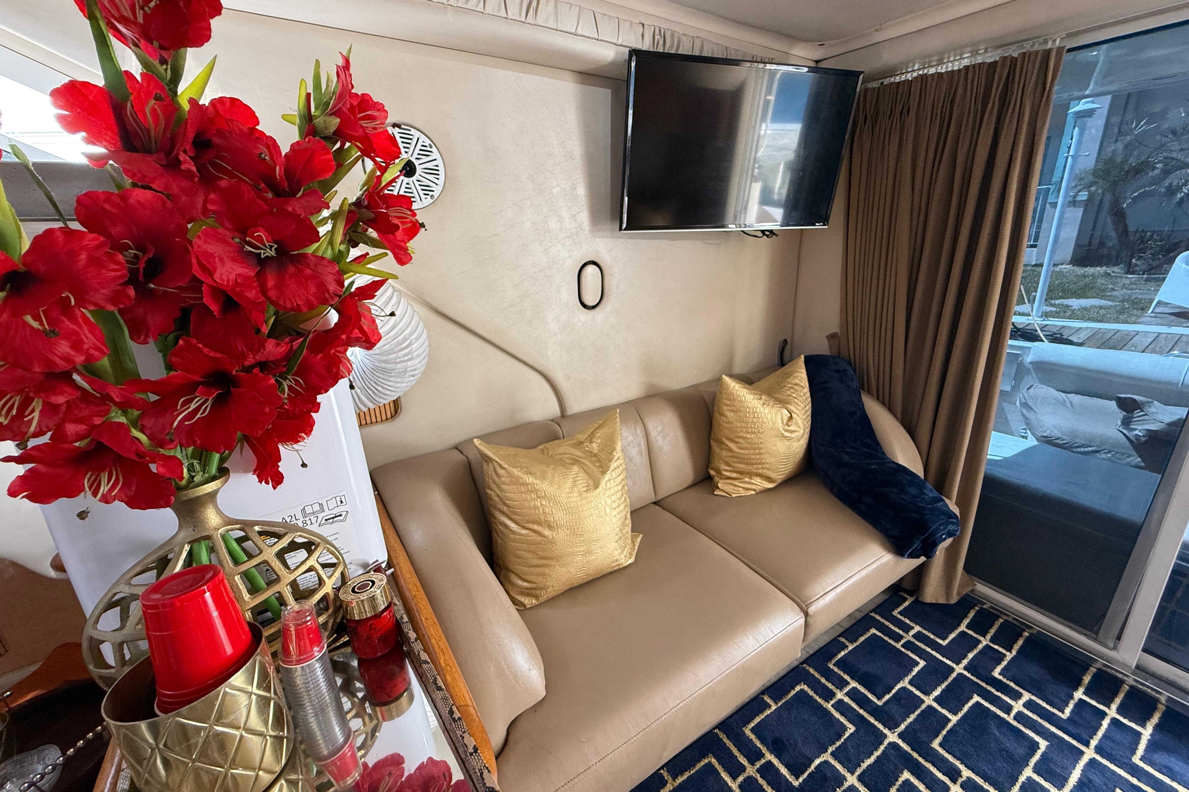 Luxurious interior of 1998 Sea Ray 400 Sedan Bridge with elegant decor and comfortable seating.