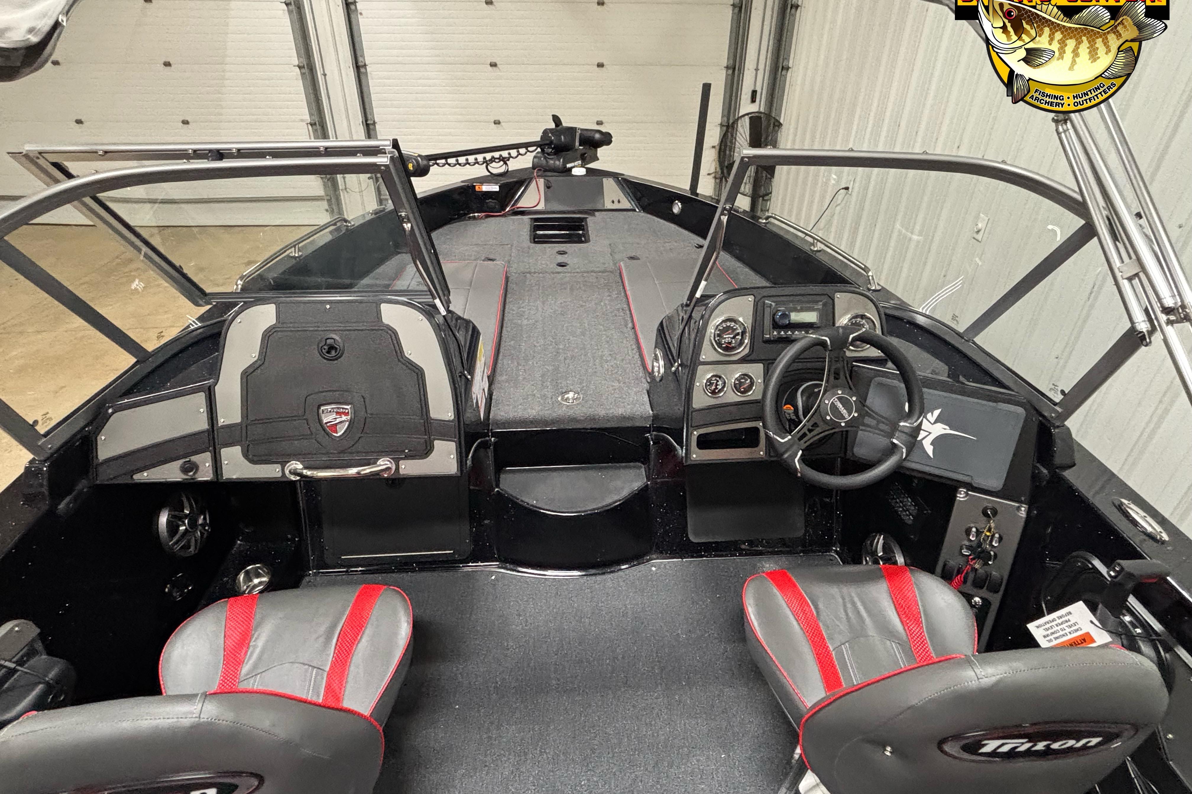 2026 Triton 206 Allure boat interior with modern dashboard and seating.