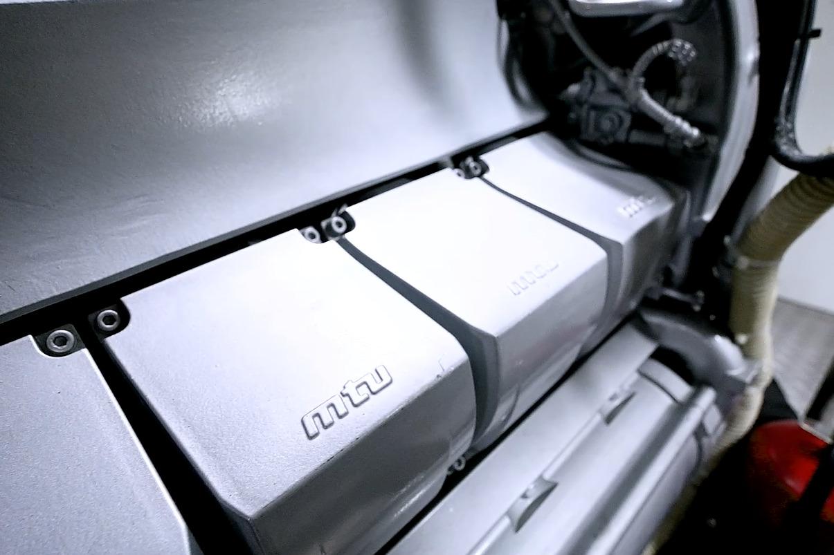 Engine compartment of a 2015 Pershing 92 yacht, featuring MTU components.
