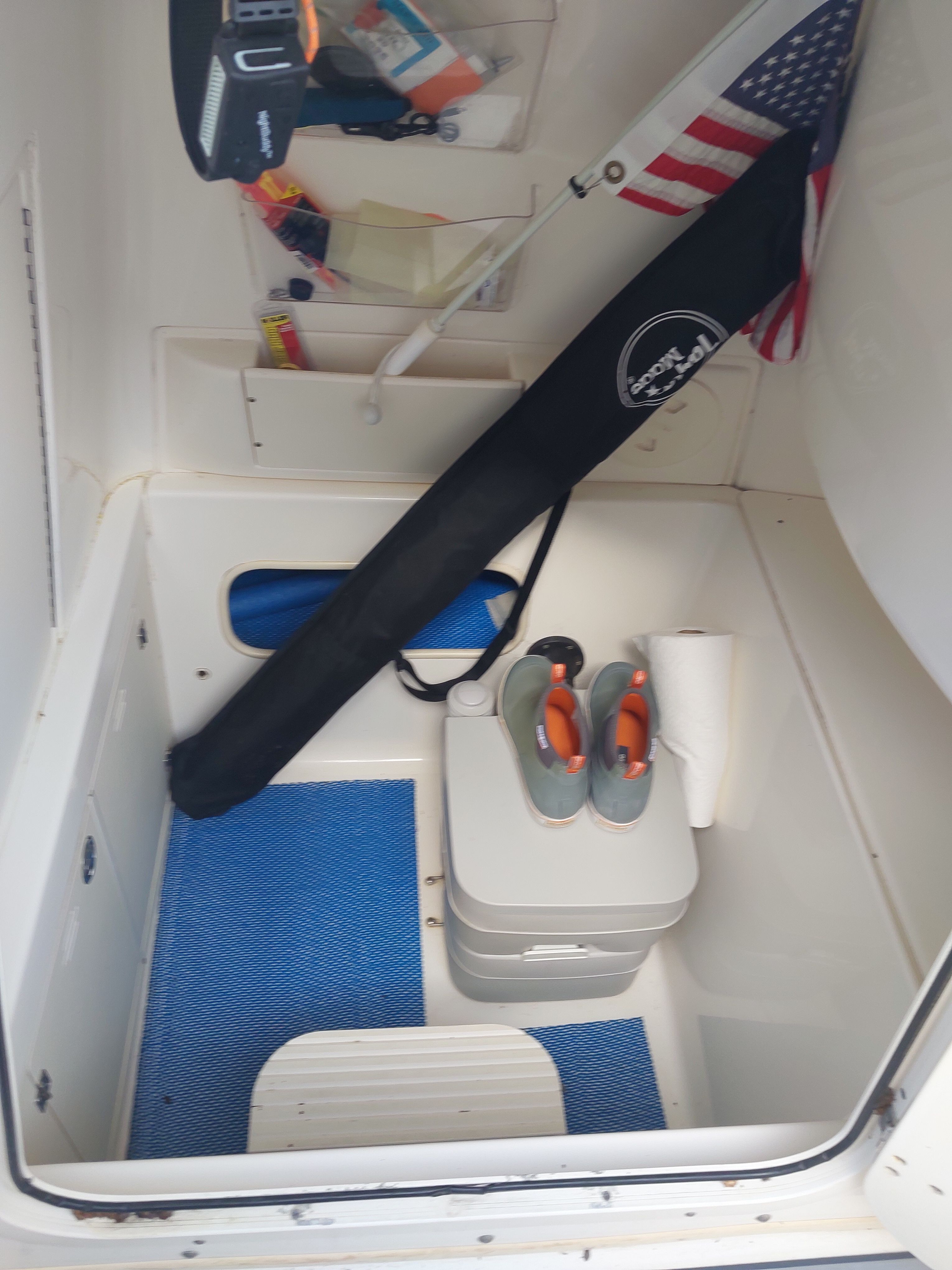 Interior of a 2005 Boston Whaler 240 Outrage with storage and accessories.