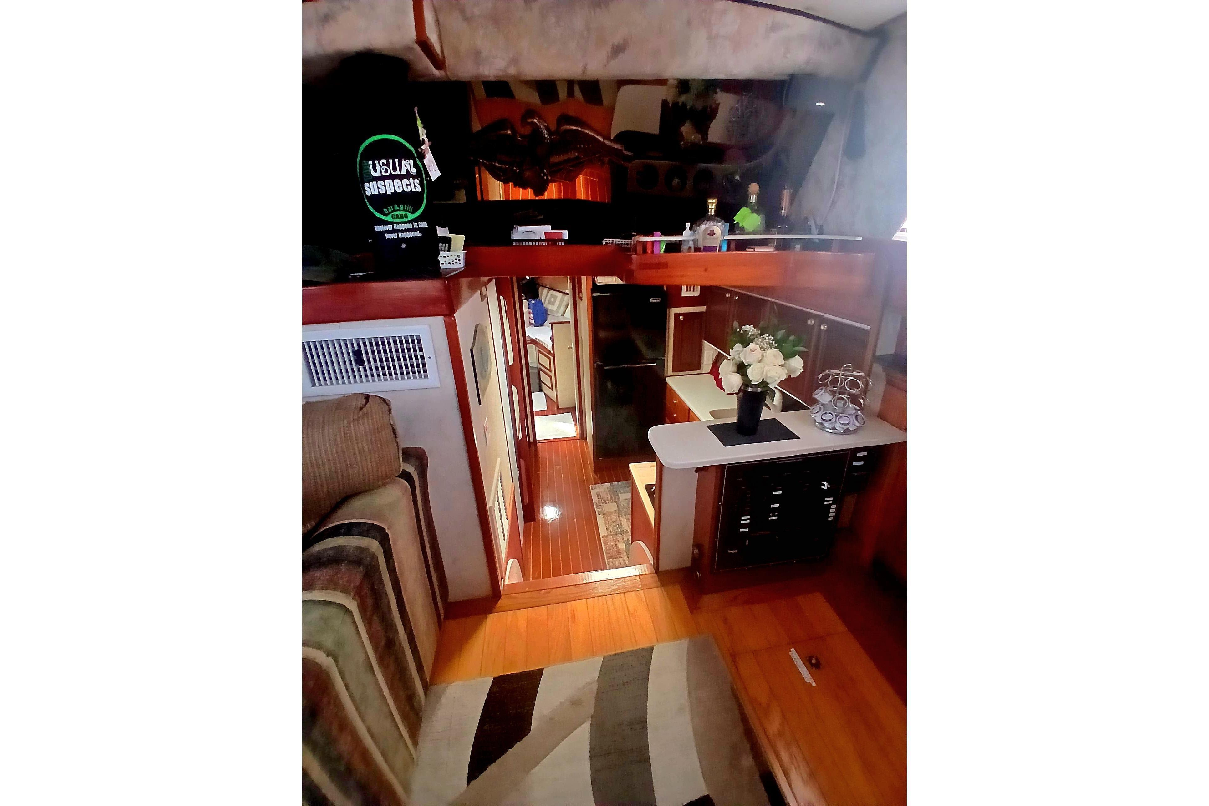 Interior of a 1976 Viking 40 Sedan Diesel yacht, featuring cozy seating and elegant decor.