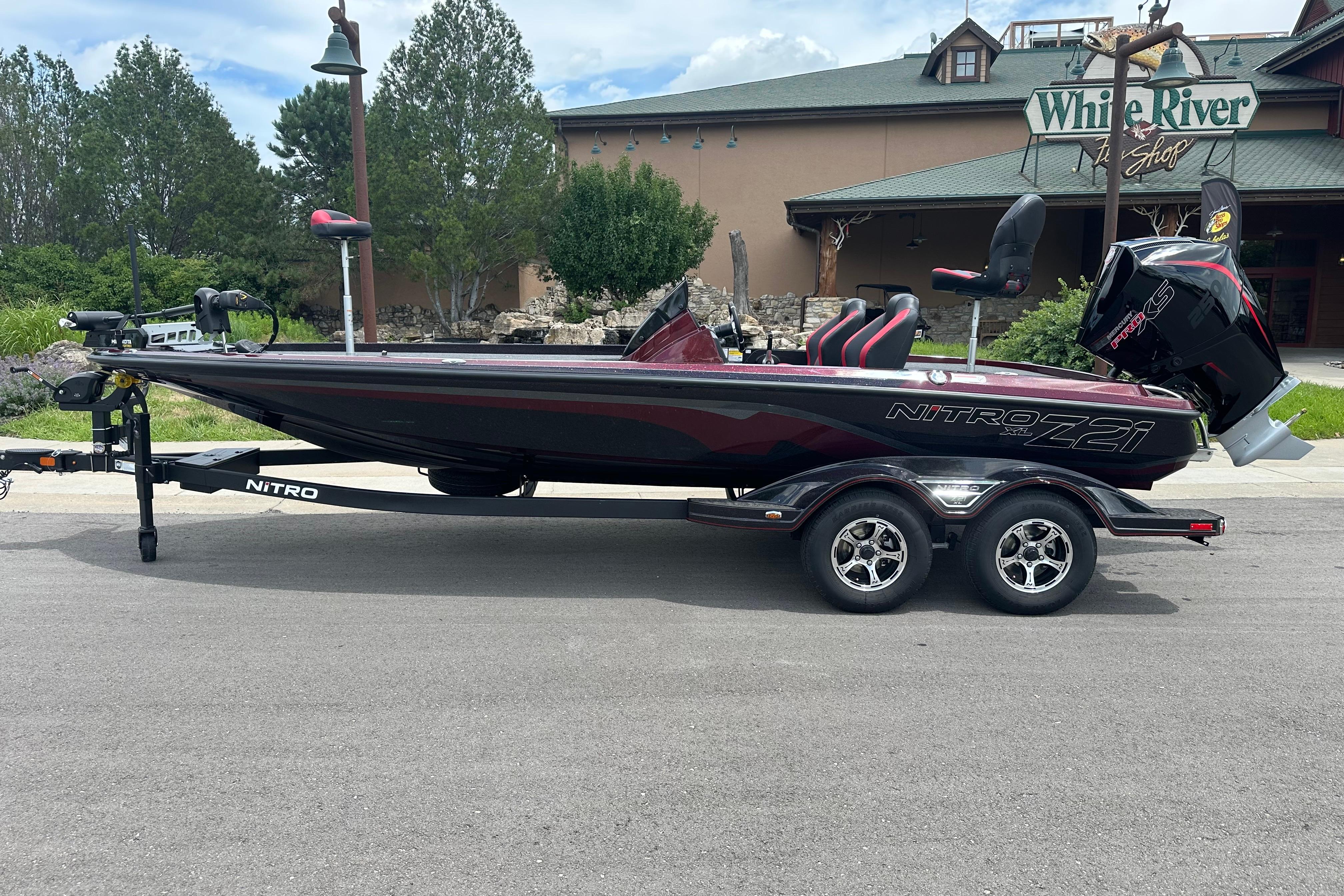 2026 Nitro Z21 XL boat on trailer, parked outside White River shop.