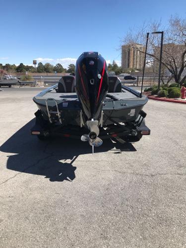 2025 Ranger ALPHA 208 boat, rear view, parked outdoors on a sunny day.
