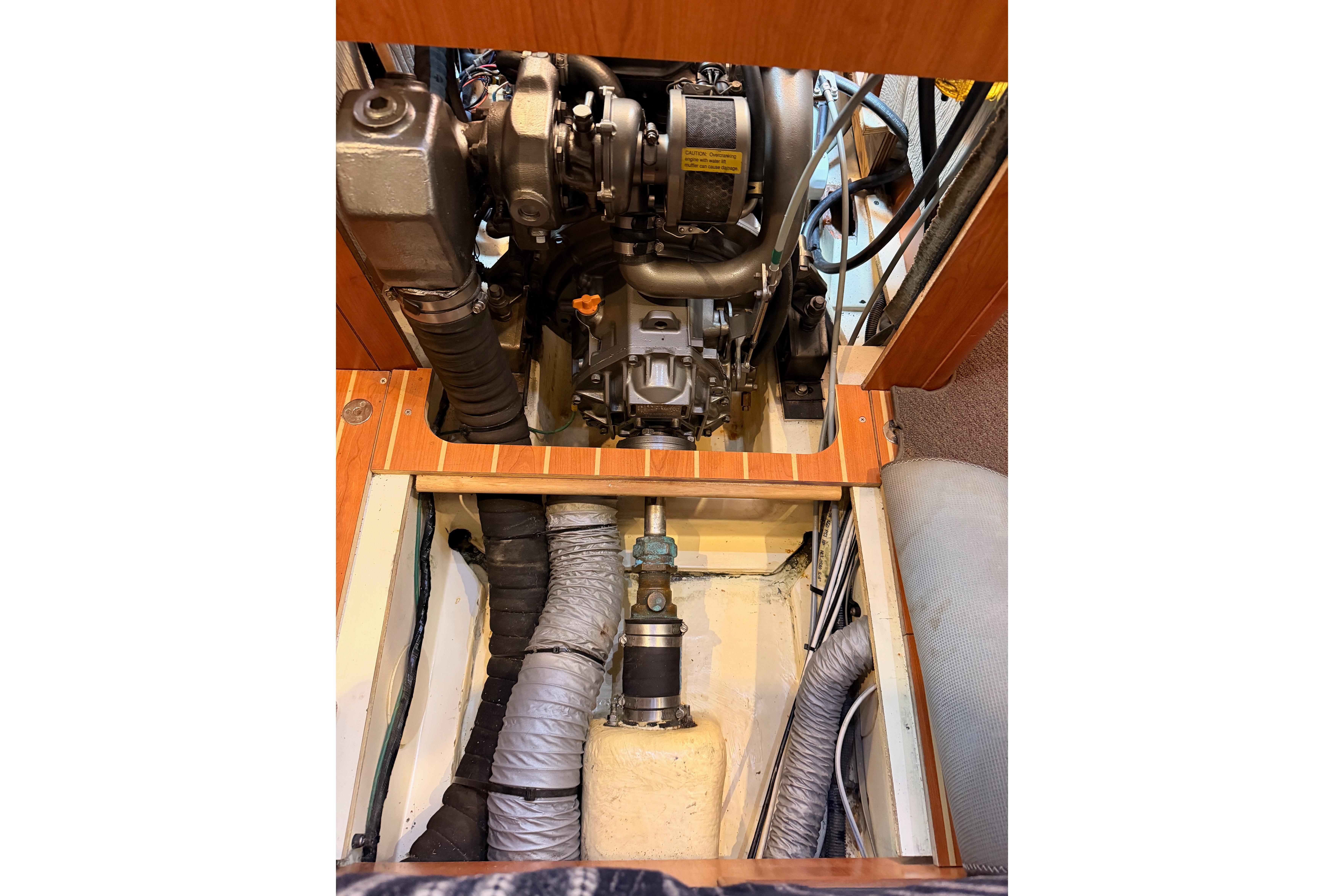 Engine compartment of 2008 Hunter 45 Deck Salon sailboat, showcasing mechanical components.