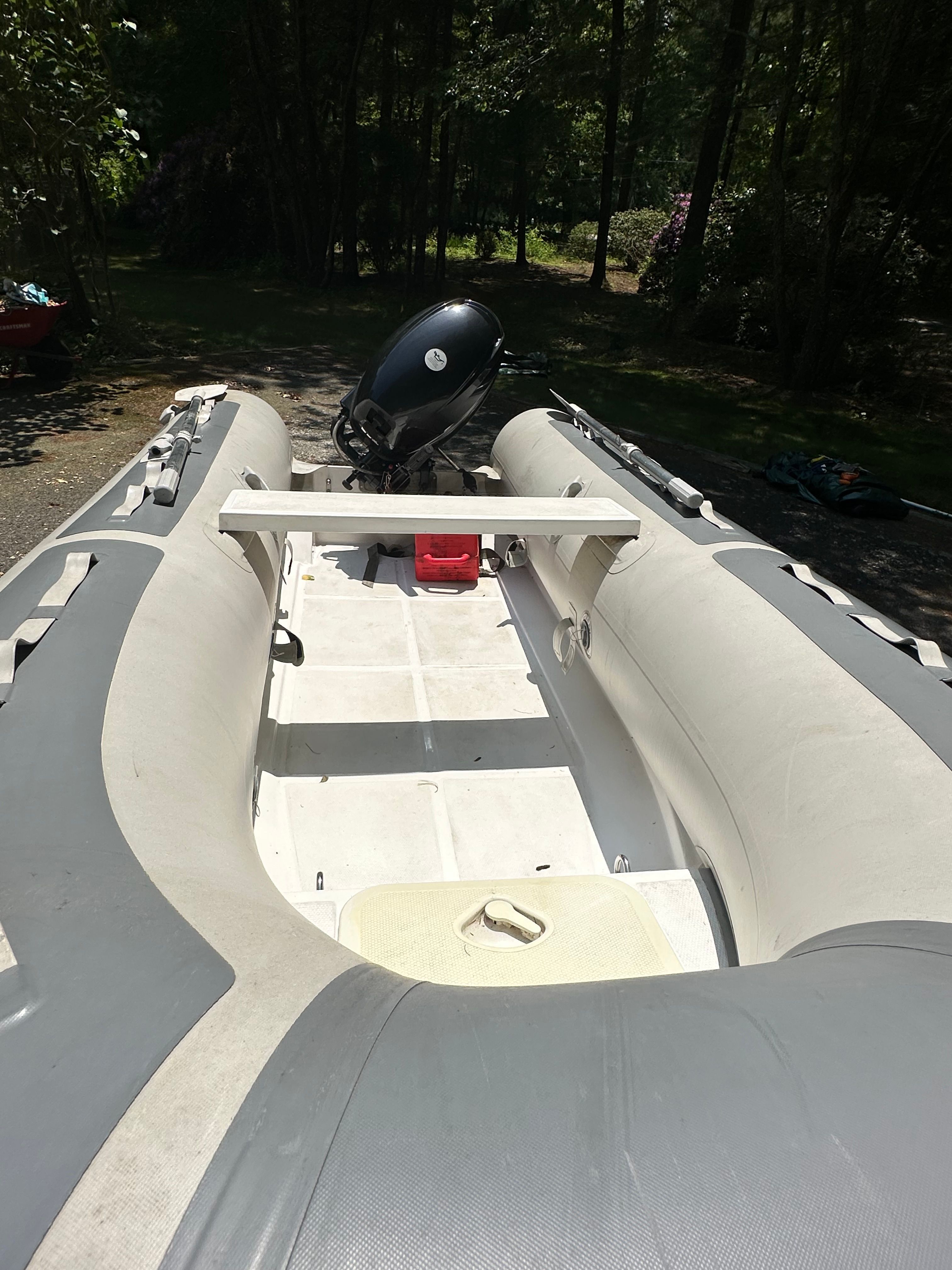 West Marine RIB 350 inflatable boat with motor, 2020 model.