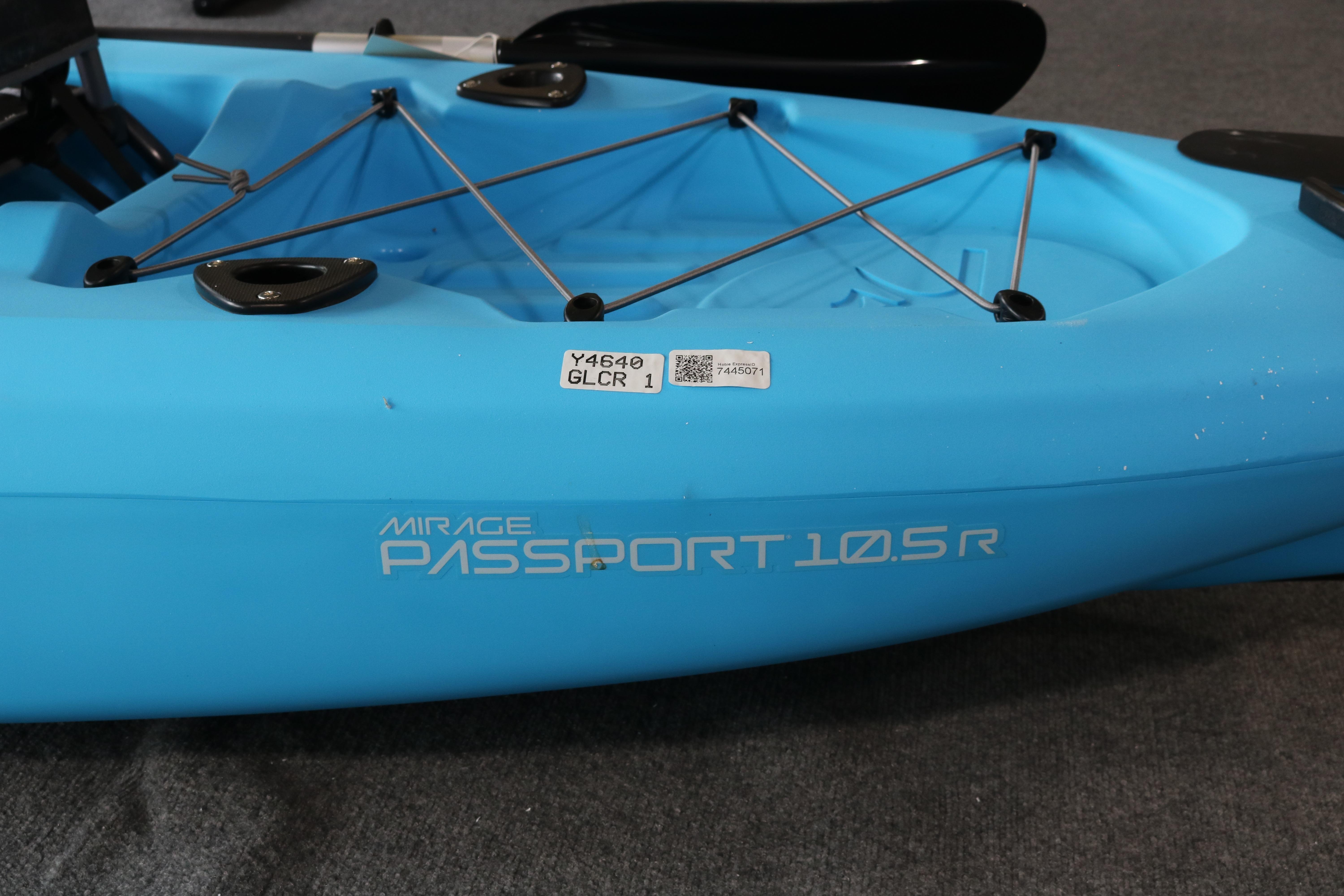Blue 2024 Hobie Mirage Passport 10.5 R kayak with bungee storage and sleek design.