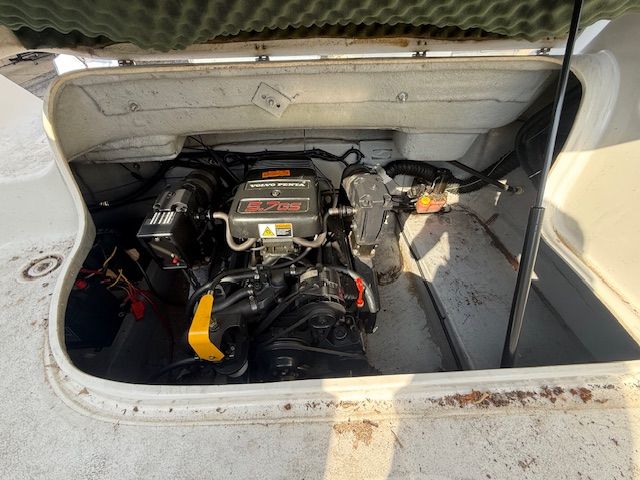 Engine compartment of a 2001 Crownline 230 CCR boat with Volvo Penta engine.
