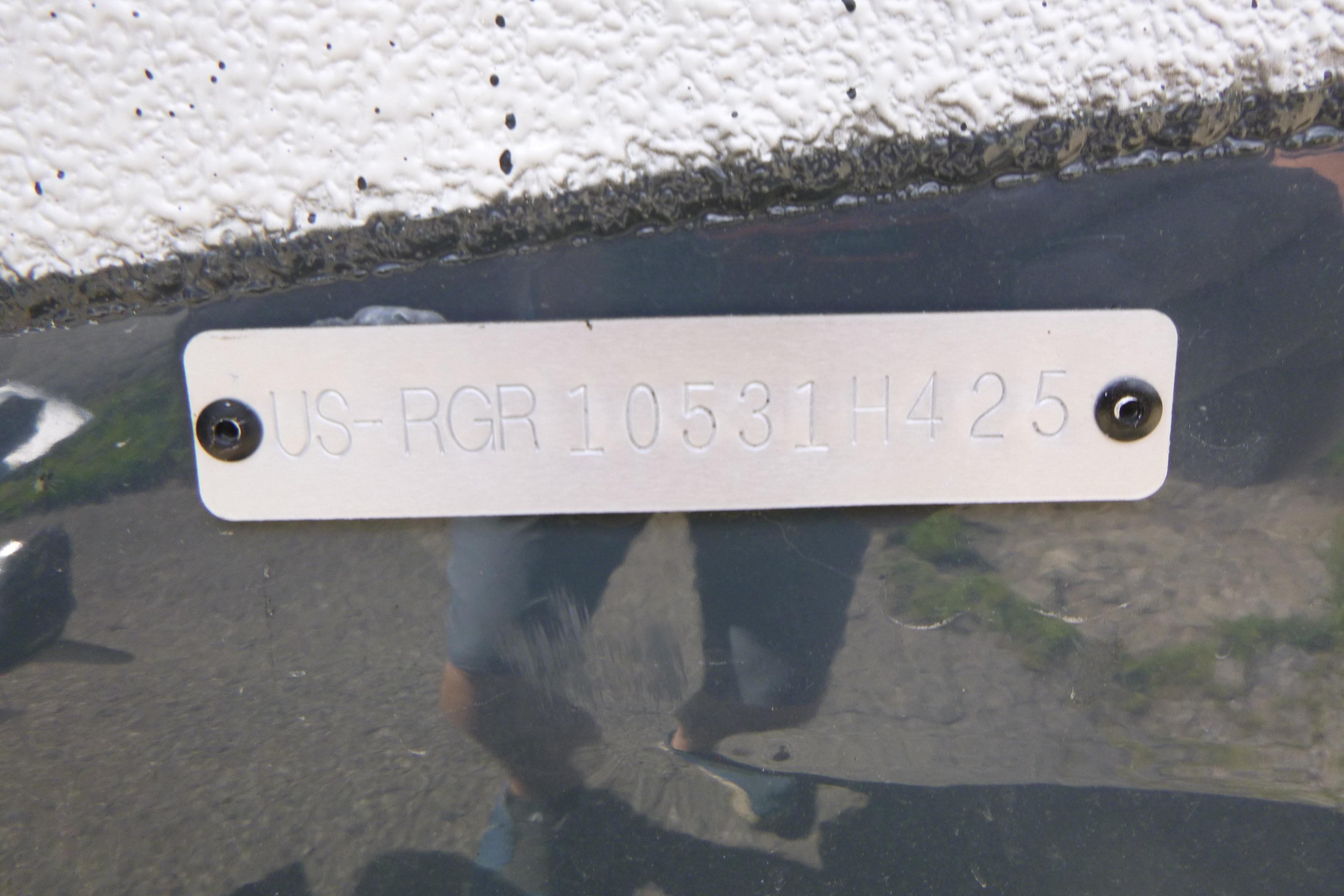 Serial number plate on 2025 Ranger RB210 boat hull.
