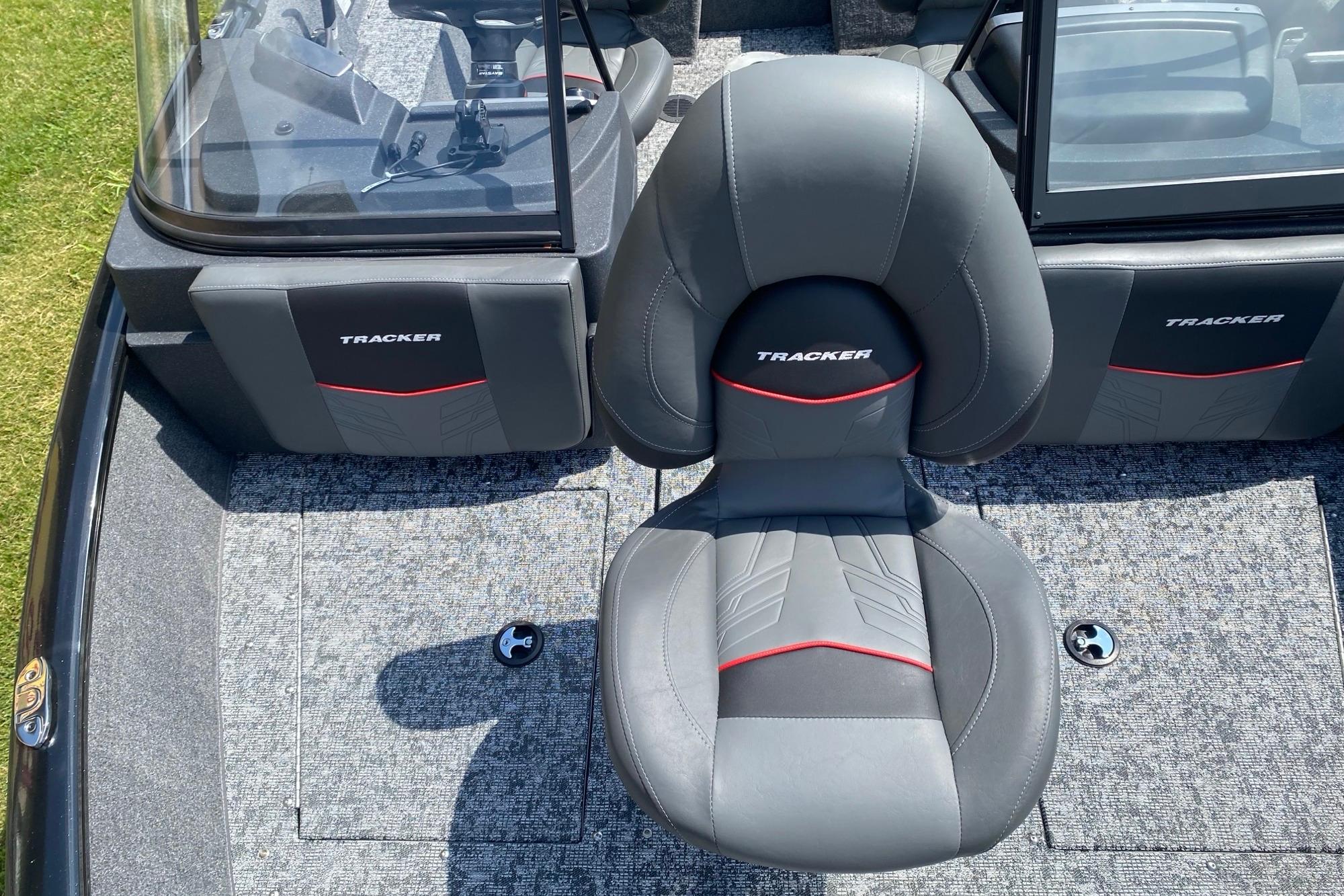 2026 Tracker Pro Guide V-175 Combo boat interior with gray seating and red accents.