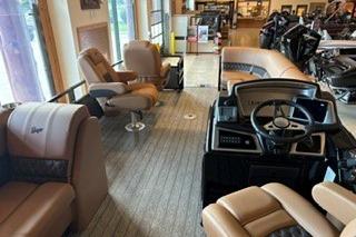 Interior of a 2026 Ranger 220FC boat with luxurious seating and modern dashboard.