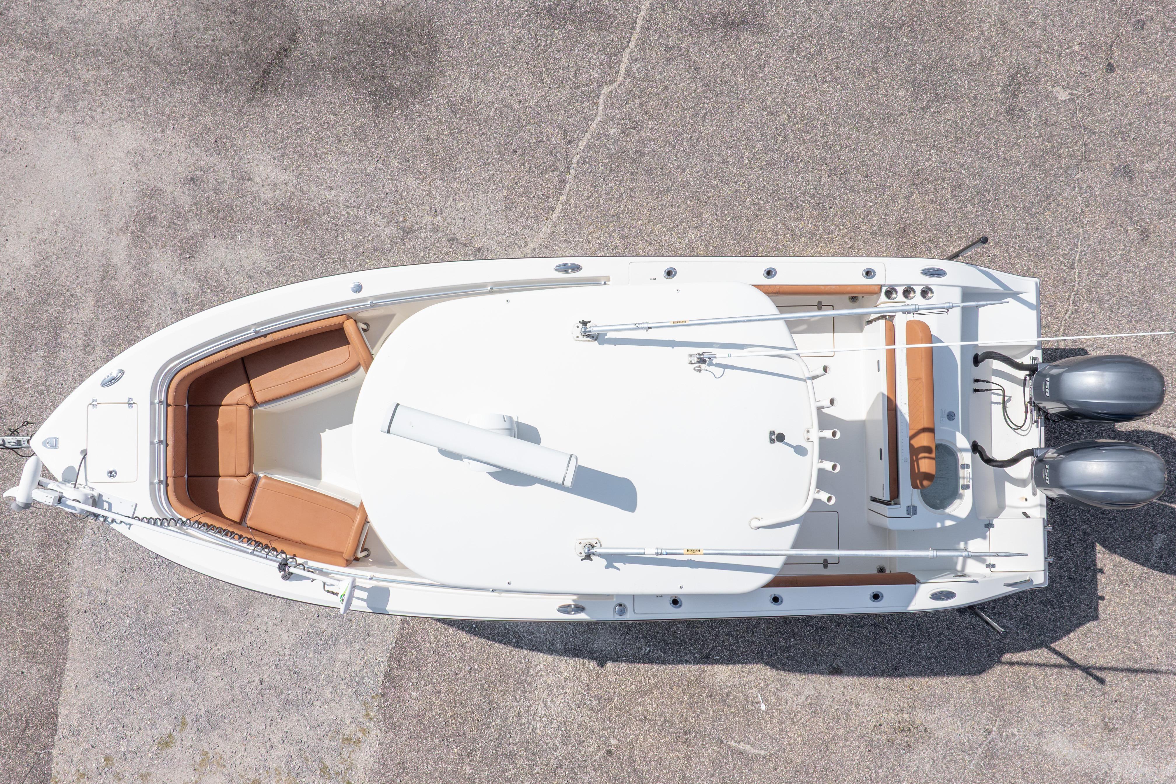 2017 Cobia 261 Center Console boat, aerial view, showcasing spacious deck and dual engines.