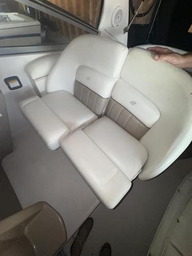 2005 Four Winns 298 Vista boat interior with white and beige seating.