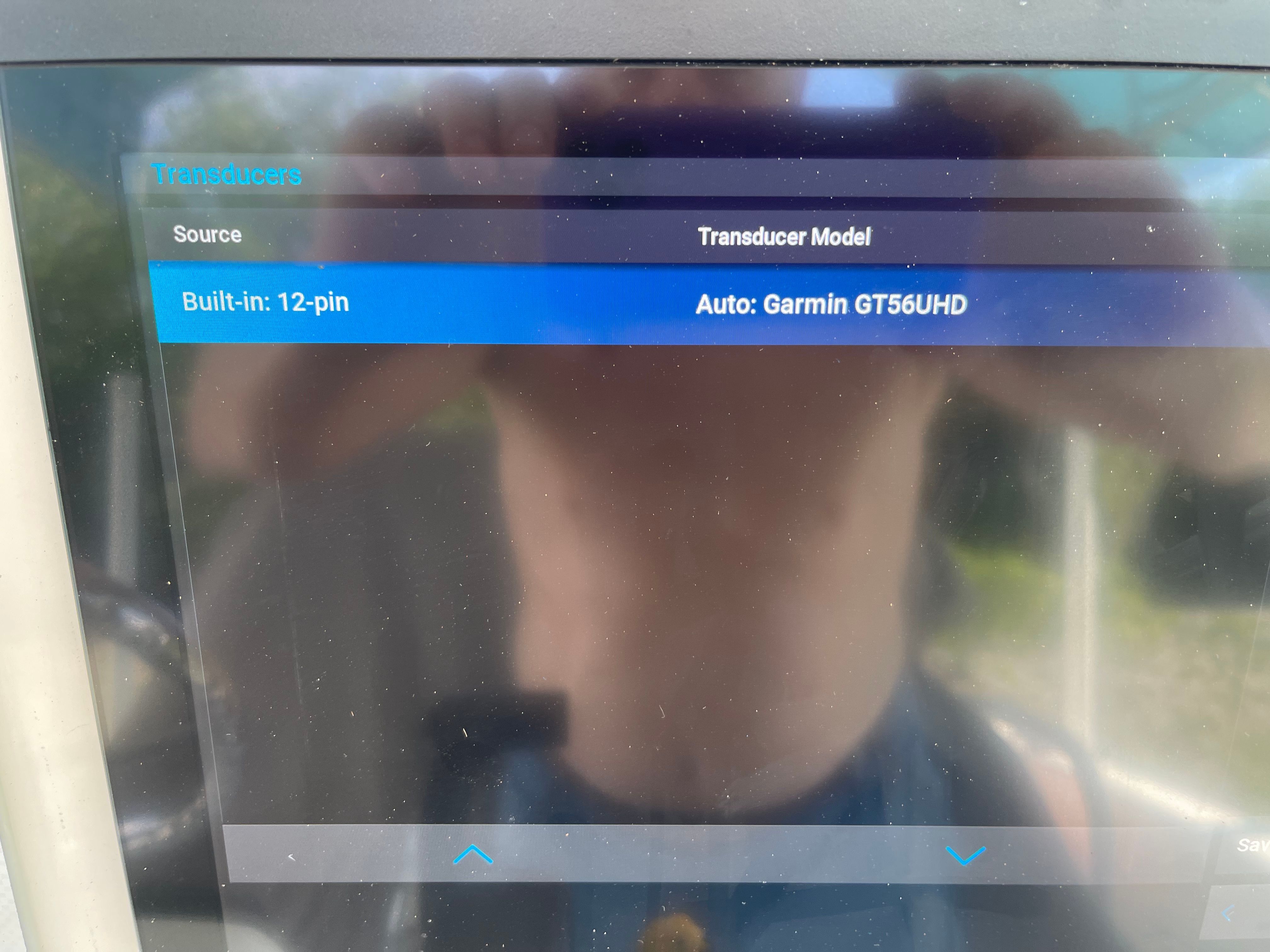 A screen displays transducer settings with a Garmin GT56UHD.