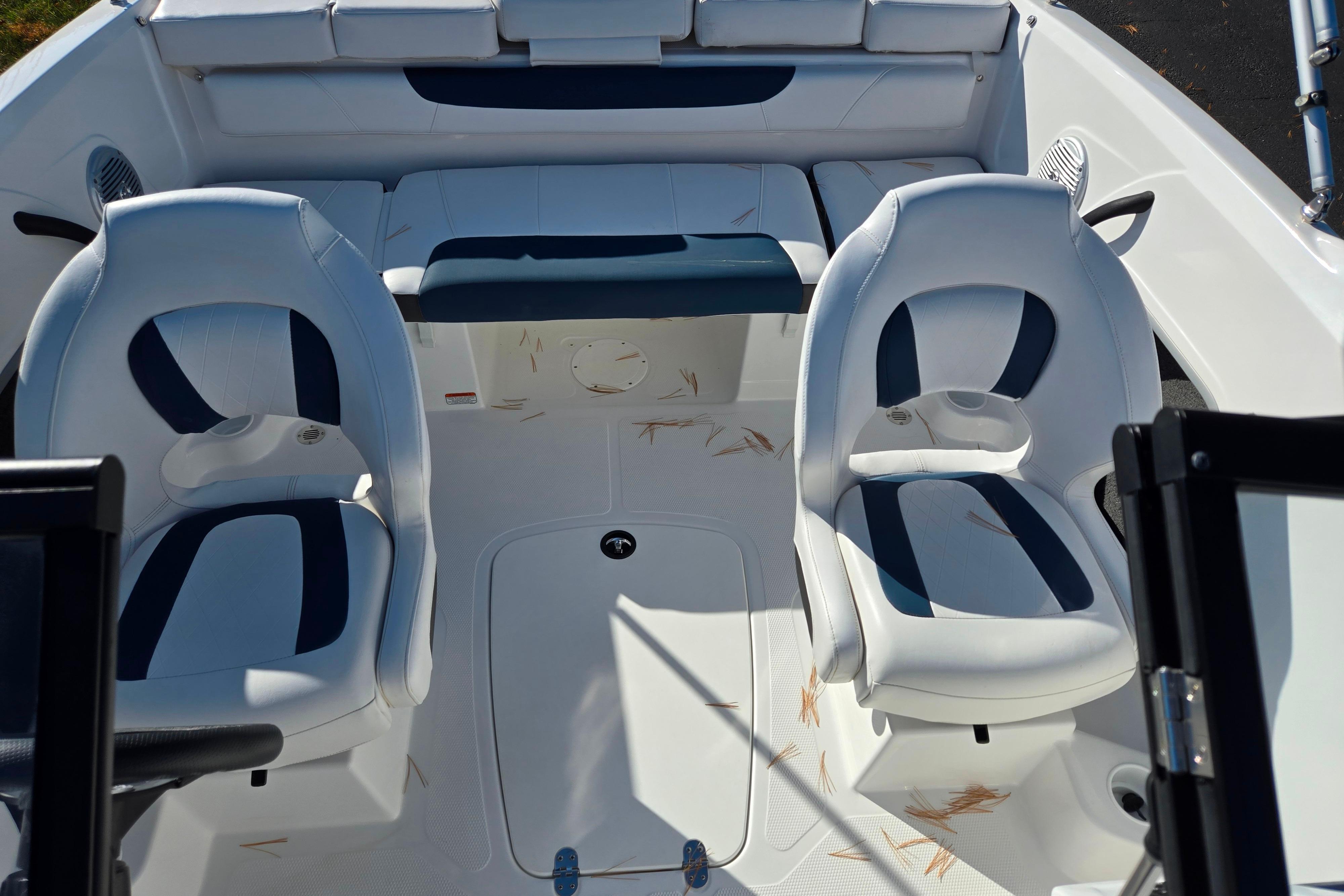 2023 Tahoe 185 S boat interior with white and blue seating arrangement.