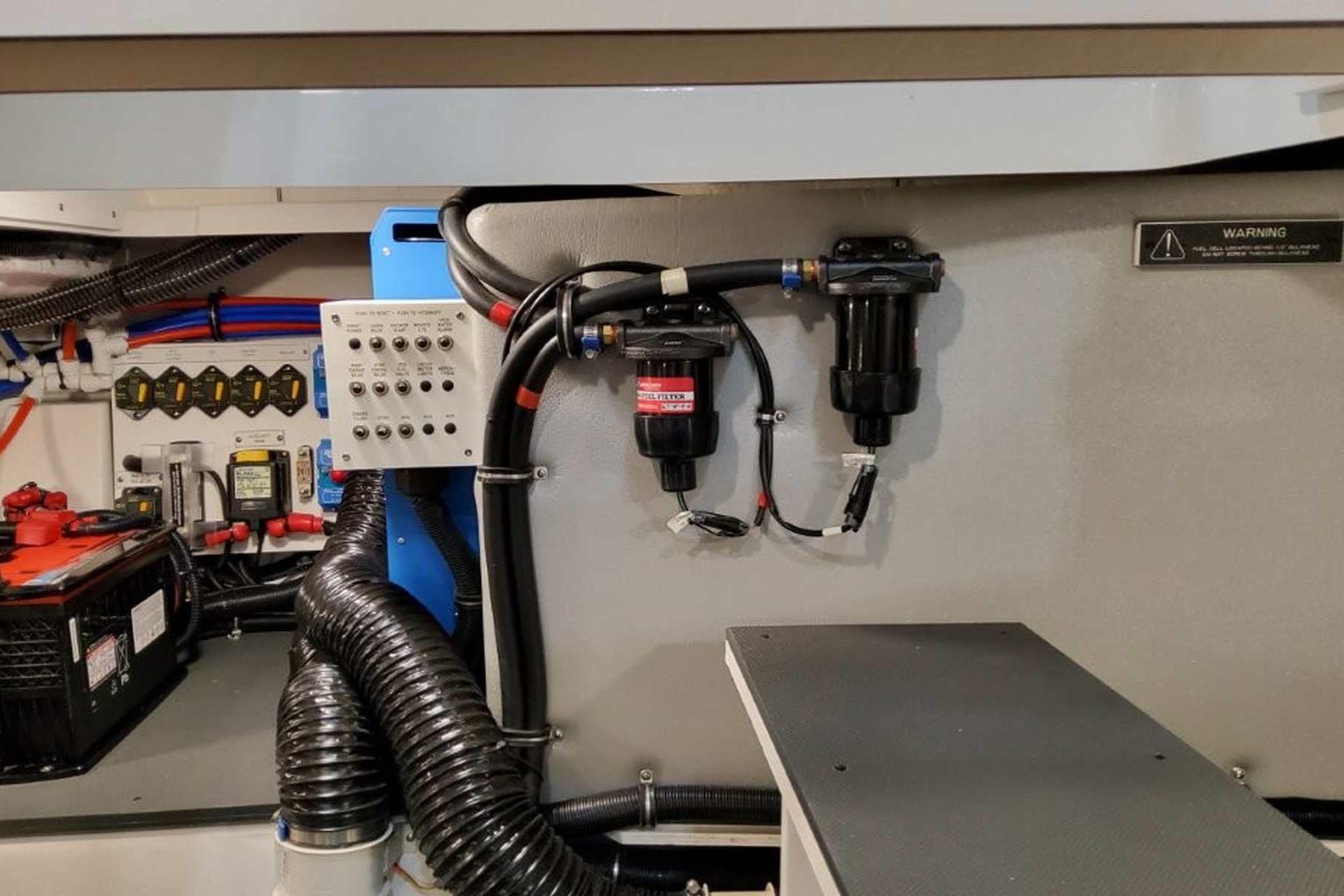 Engine room of 2026 Formula 400 Super Sport Crossover with control panel and wiring.