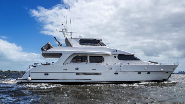 Grand Harbour 76 yacht cruising on the water, 2001 model.